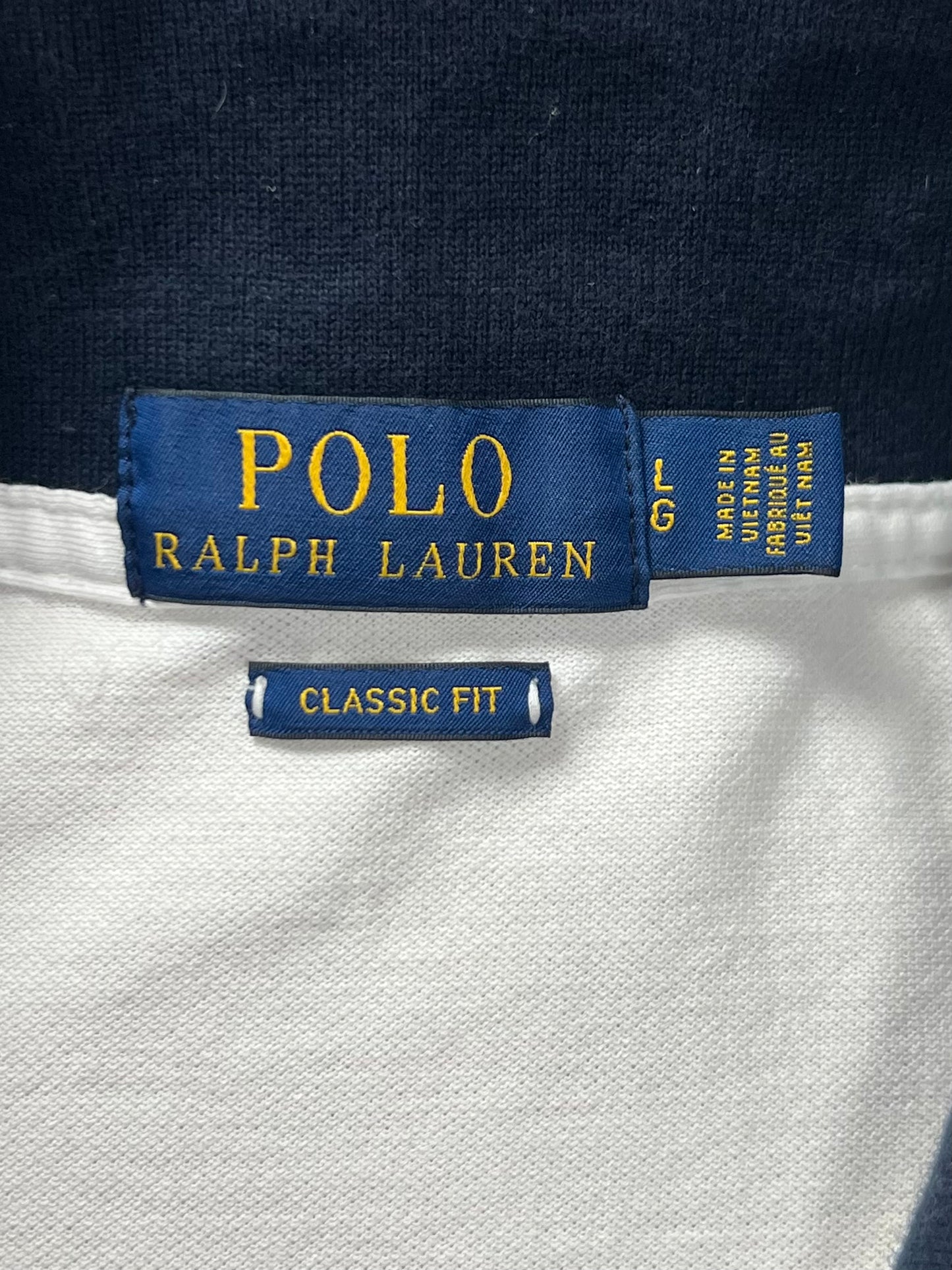 Camiseta Polo Ralph Lauren 🏇🏼 color blanco con diseño en azul y rojo Talla L Entalle Clásico