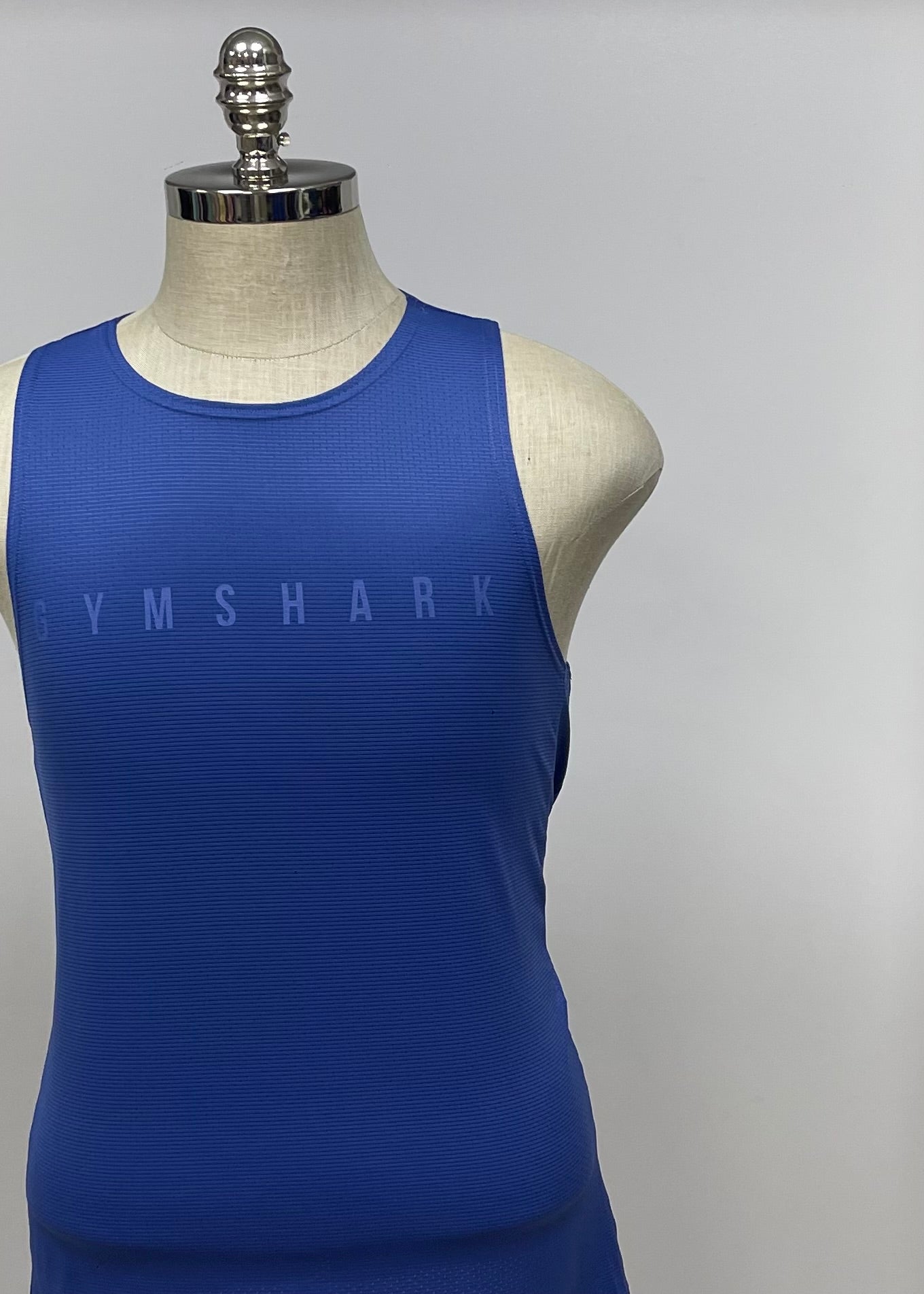 Camiseta de entrenamiento sin mangas Gymshark 🏋🏽 color azul y logo en celeste Talla S