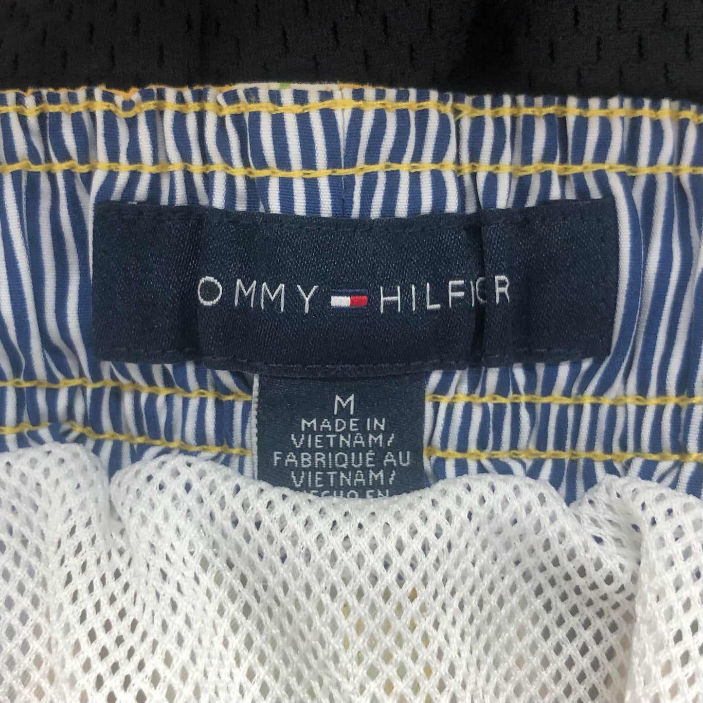 Shorts de baño Tommy Hilfiger 🇺🇸 en color amarillo con diseño de tropical talla M