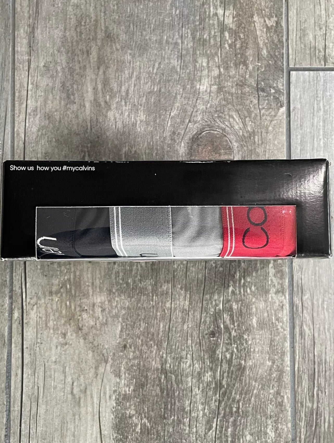 Paquete de 3 Calzoncillos tipo Boxer Calvin Klein de Microfibra Stretch en rojo, gris y negro - Tela ligera en Talla XXL