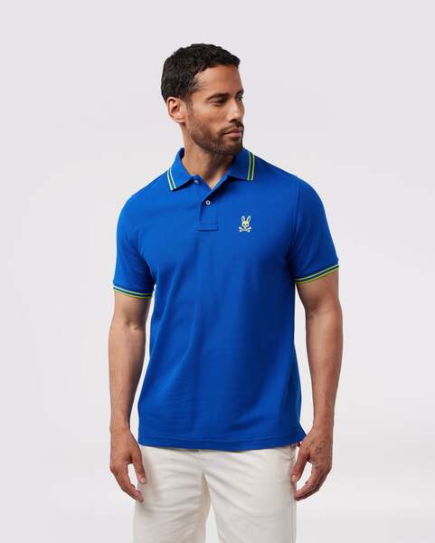 Camiseta Polo Psycho Bunny 🐰 Pique en color azul con diseño de cuello en verde intenso Talla S Entalle Regular