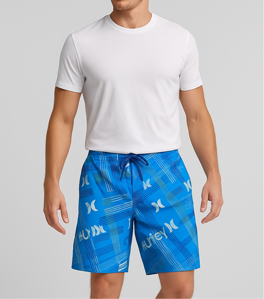 Short de baño Hurley 🏄🏽‍♂️ color azul y diseño de líneas en color celeste y gris y con logo en color gris Talla XXL