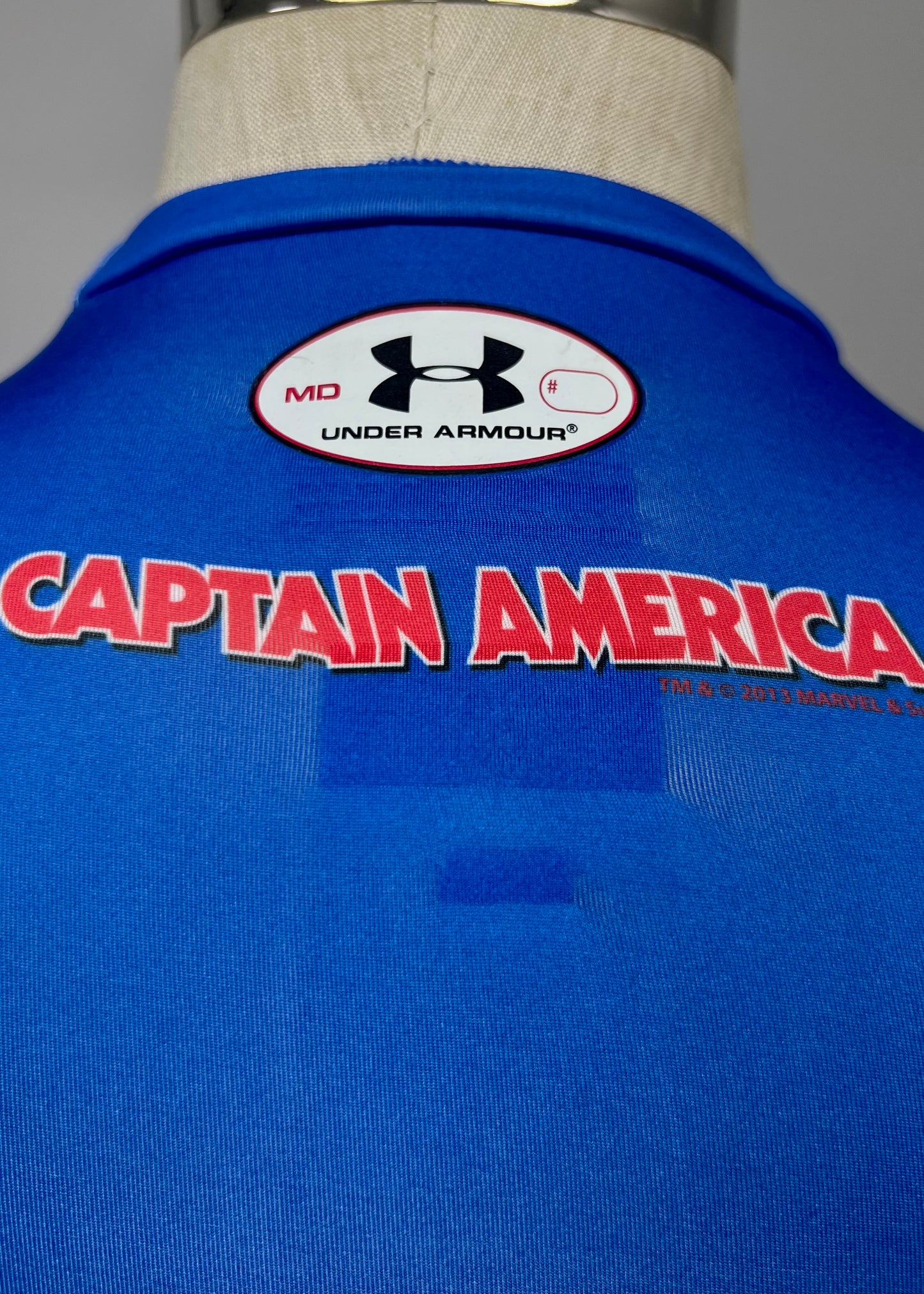 Camiseta de compresión Under Armour 🏋🏽 color azul con diseño de capitán america Talla M