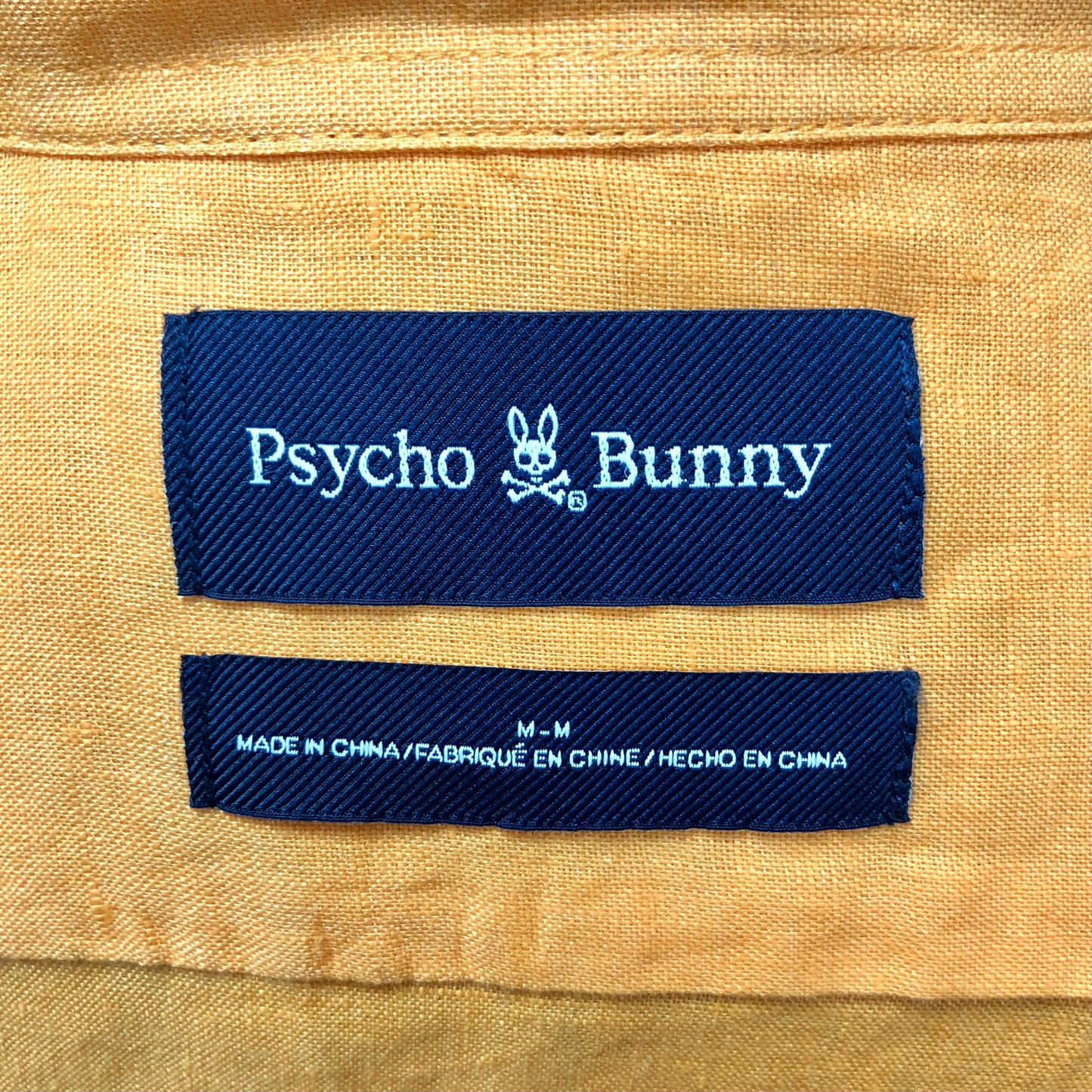 Camisa de botones Psycho Bunny 🐰  Tela de lino color naranja intenso Talla M y L Entalle Regular