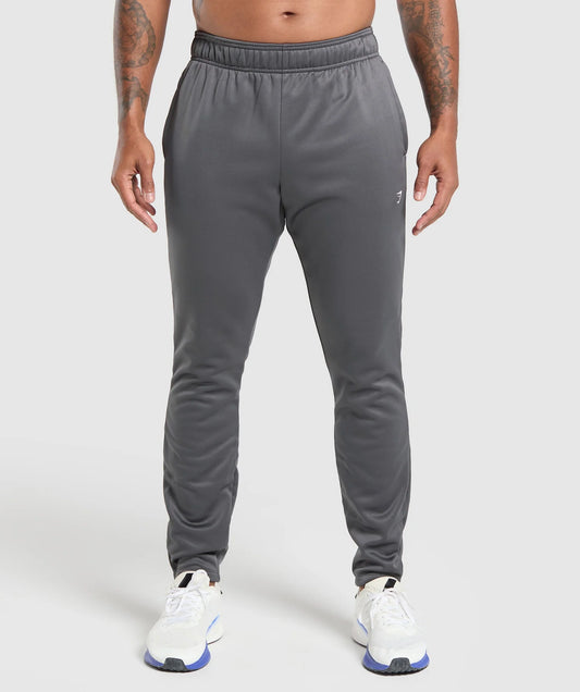 Pantalon Jogger marca Gymshark 🏋🏽 color gris oscuro Talla S Entalle Slim Fit