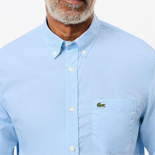 Camisa de botones Lacoste 🐊 Oxford color celeste Talla L Entalle Regular
