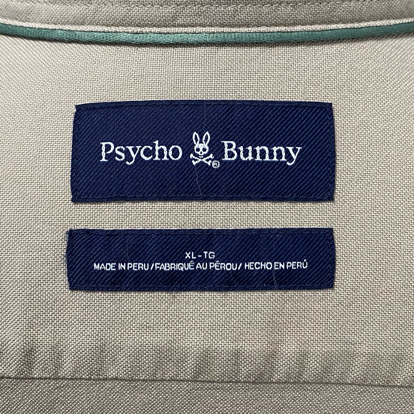 Camisa de botones Psycho Bunny 🐰  Oxford Color Kaki con logo tradicional Talla XL Entalle Regular