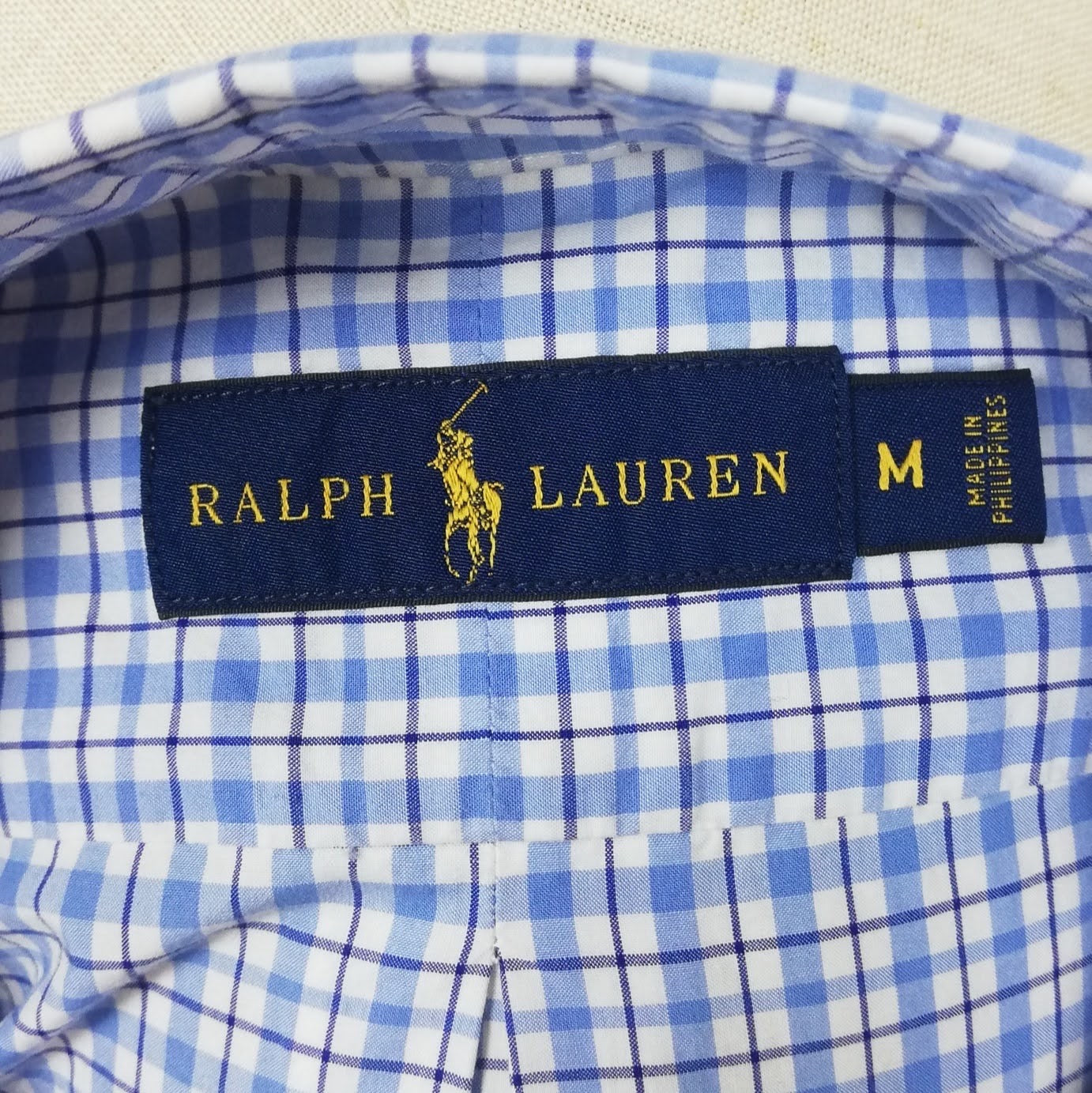 Camisa Polo Ralph Lauren 🏇🏼 color blanco con patron de cuadros en celeste y azul navy Talla M Entalle Regular