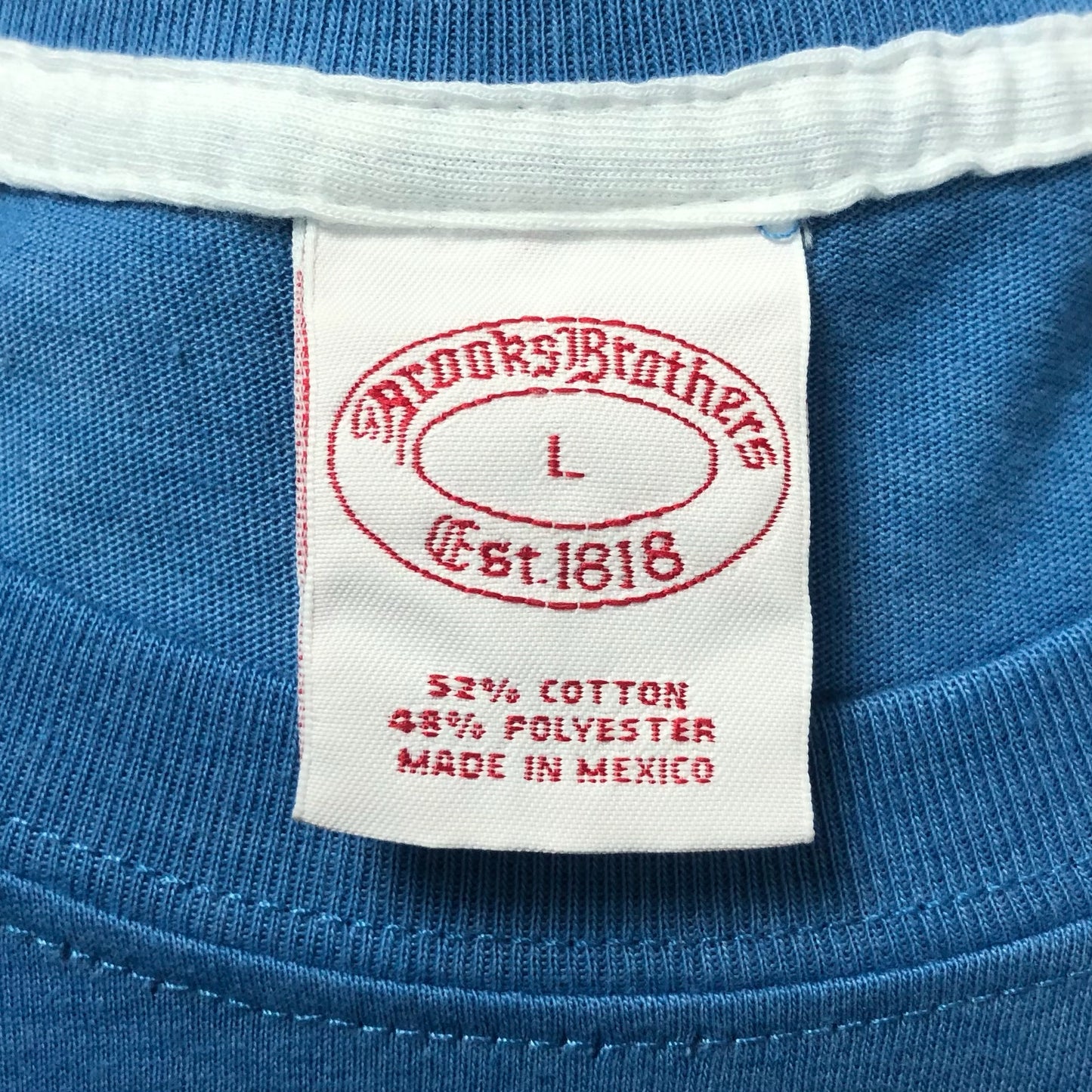 Camiseta cuello redondo Brooks Brothers 🐑 color celeste y diseño de logo universitario Talla L