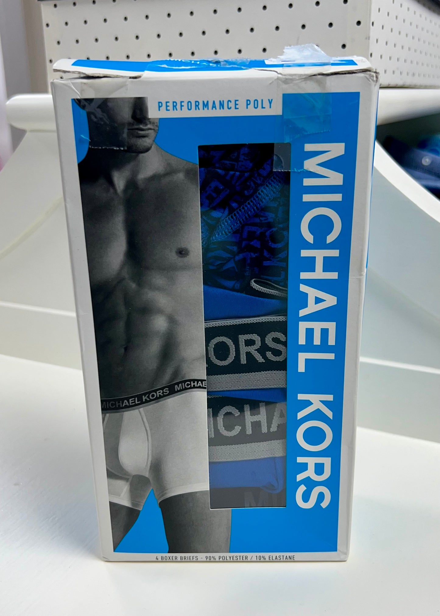 Combo de 4 Boxers Briefs Michael Kors color Azul y negro Talla S