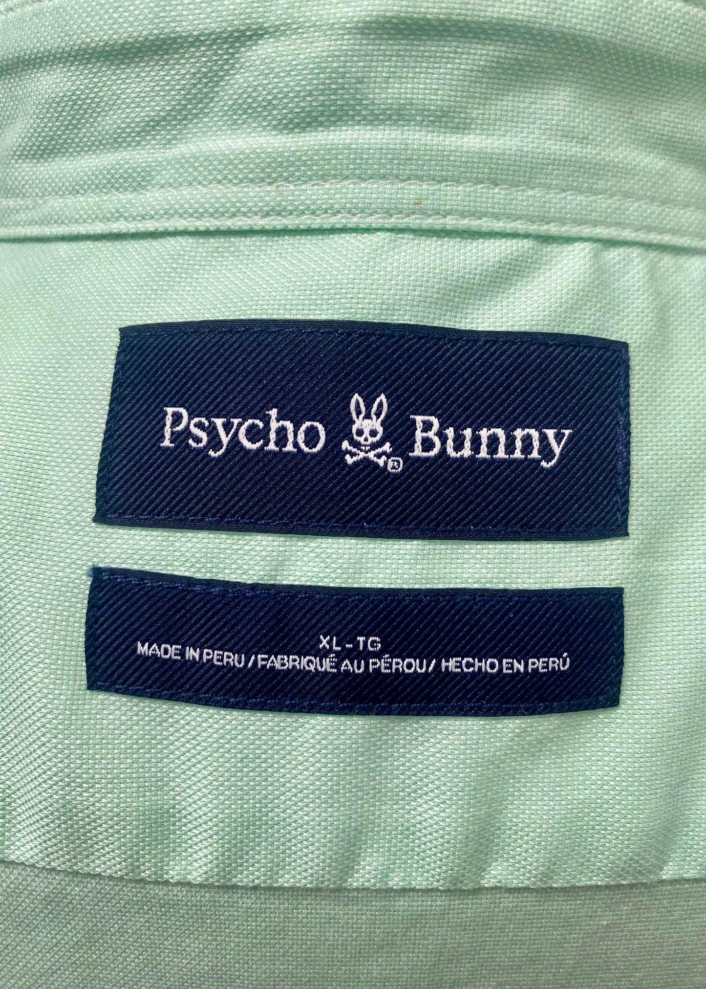 Camisa de botones Psycho Bunny 🐰  Oxford Color verde claro con logo tradicional Talla XL Entalle Regular