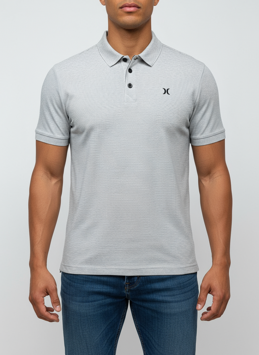 Camiseta Polo Hurley 🛹 con patron de rayas en color gris y blanco Talla S Entalle Regular