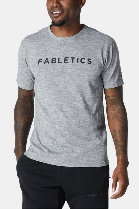 Camiseta cuello redondo Fabletics 🏋🏽 color gris y logo en negro Talla S