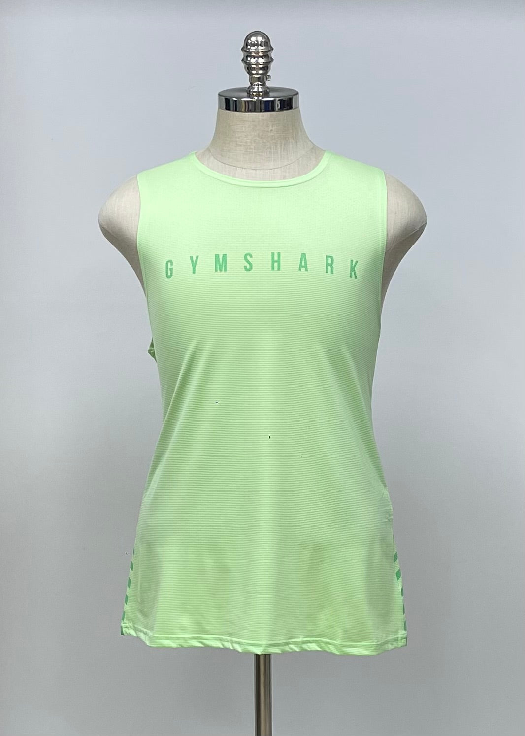 Camiseta de entrenamiento sin mangas Gymshark 🏋🏽 color verde claro y logo en verde Talla S