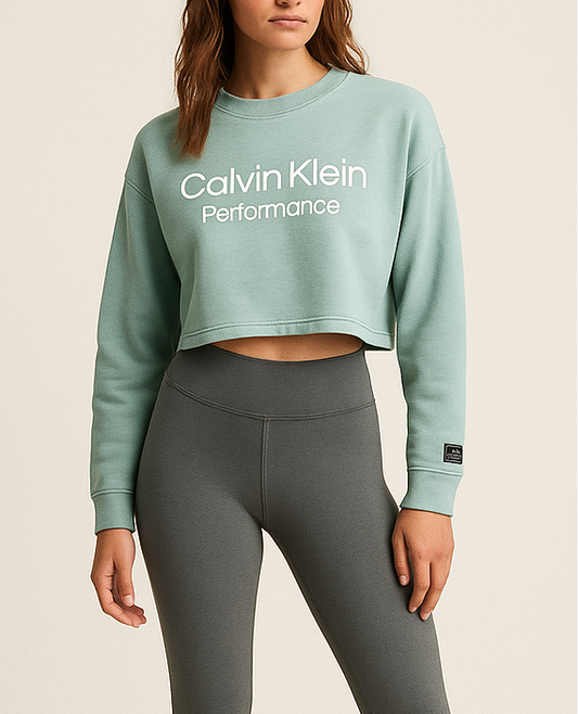 Camiseta crop top de mujer Calvin Klein Performance manga larga en color turquesa Talla M