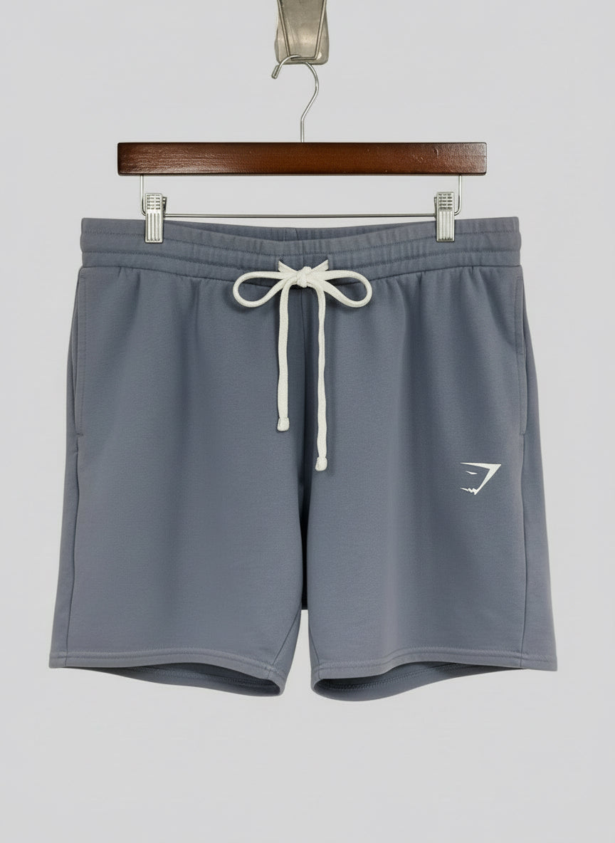 Short Lounge Gymshark 🏋🏼‍♂️ color gris y logo en blanco Talla XL
