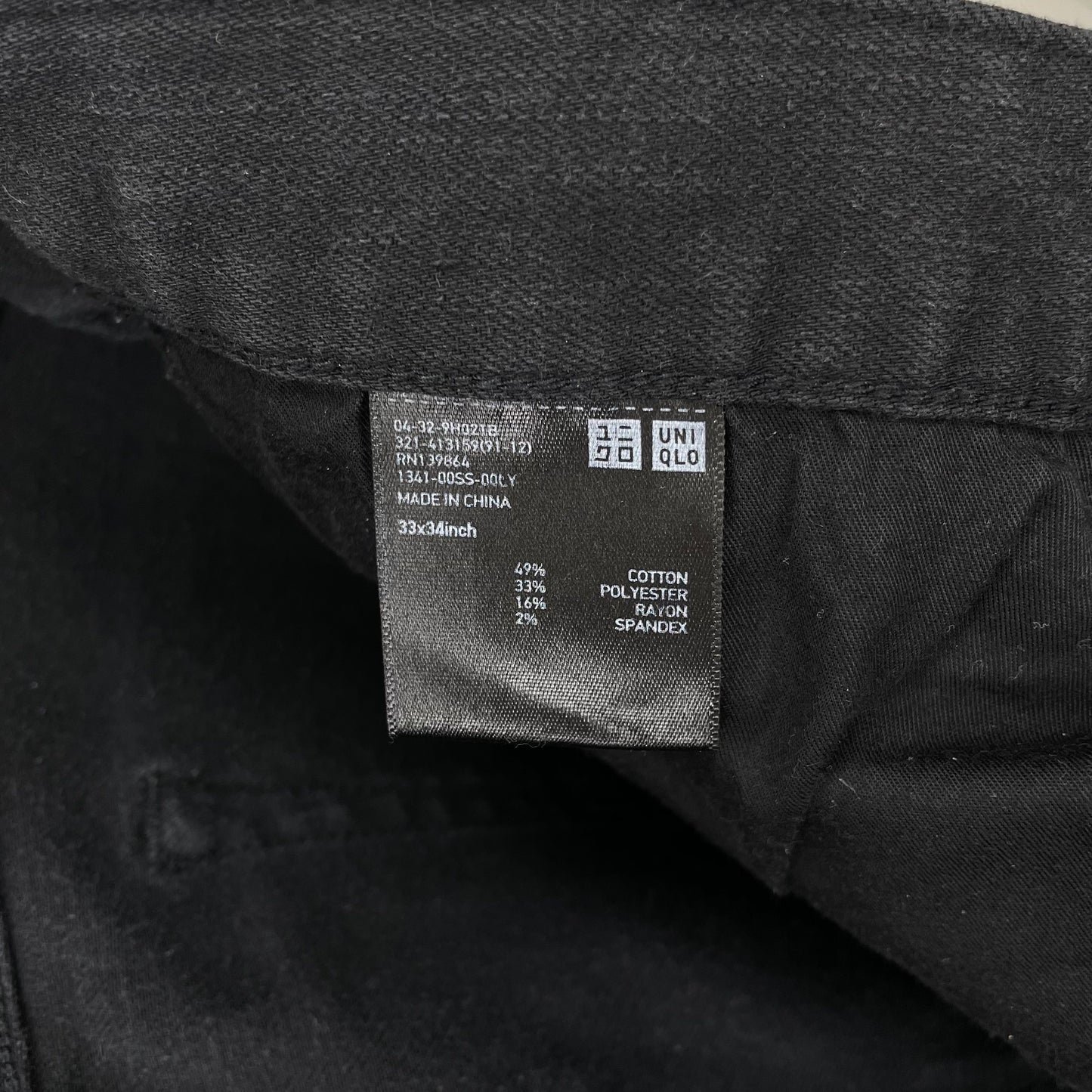 Pantalón jeans Uniqlo color negro Talla 33x34 Corte Slim Fit