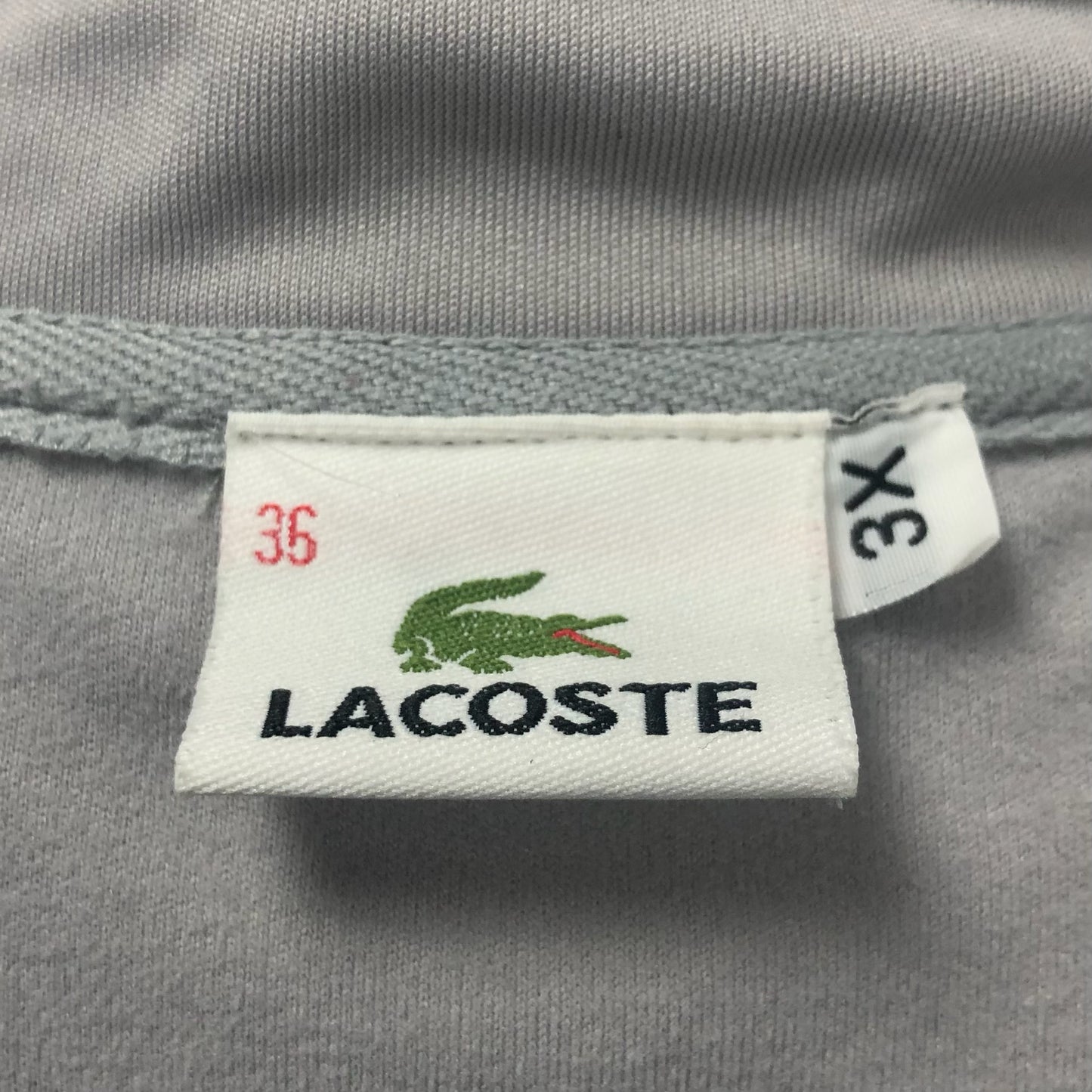 Jacket Lacoste 🐊 color gris claro con zíper completo Talla 3XL (ver descripción)