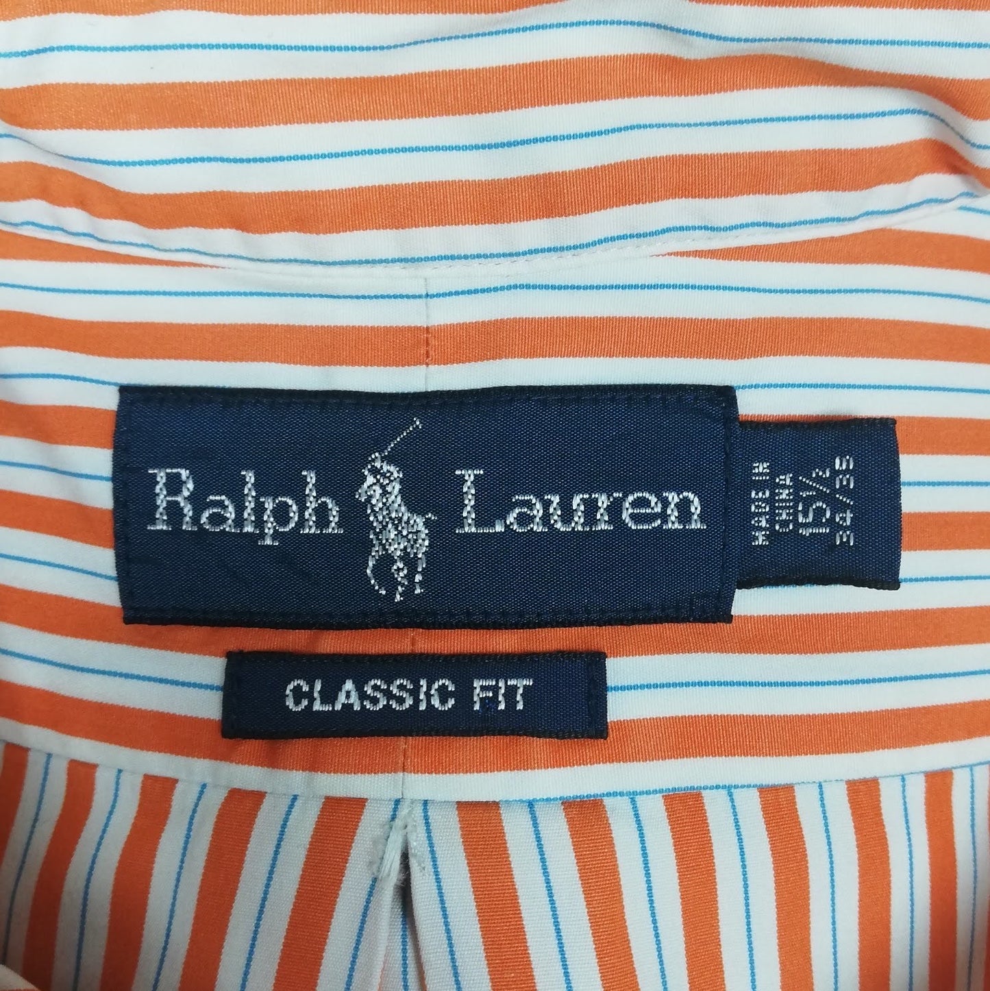 Camisa Polo Ralph Lauren 🏇🏼 color blanco con rayas en color naranja y celeste Talla M Entalle Clásico