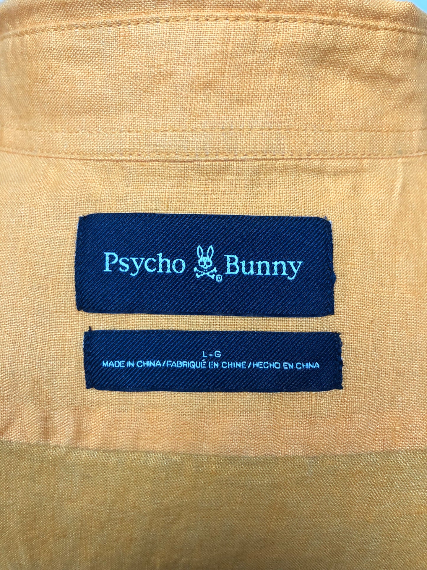 Camisa de botones Psycho Bunny 🐰  Tela de lino color blanco de color naranja intenso Talla M y L Entalle Regular