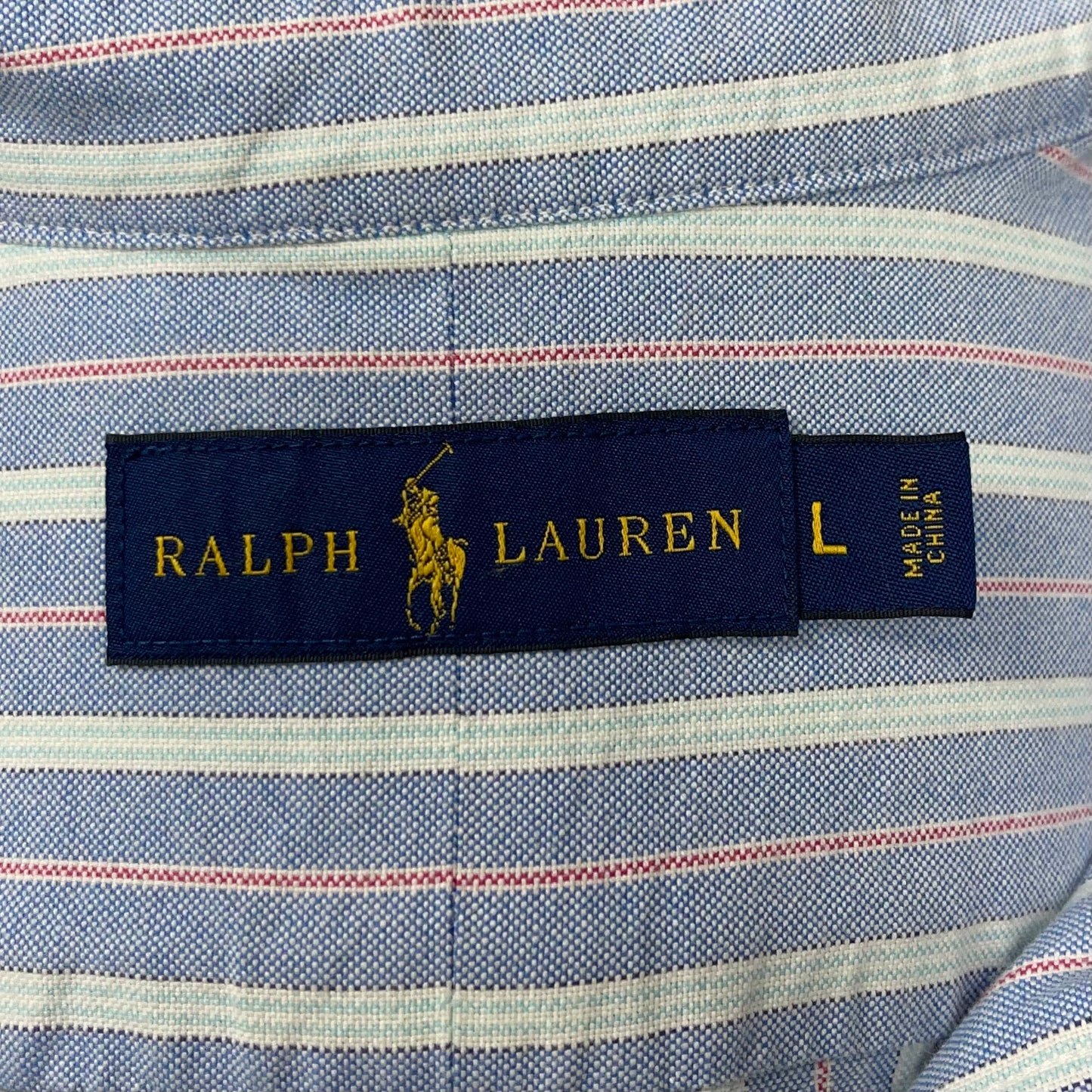 Camisa Polo Ralph Lauren 🏇🏼 Oxford color celeste con rayas en color verde y rojo Talla L Entalle Regular