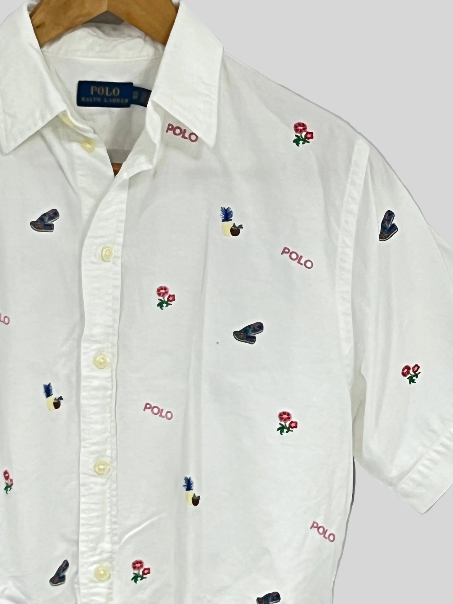 Camisa de mujer Polo Ralph Lauren 🏇🏼 color blanco con diseño de logos hawaianos bordados Talla XS Entalle Regular