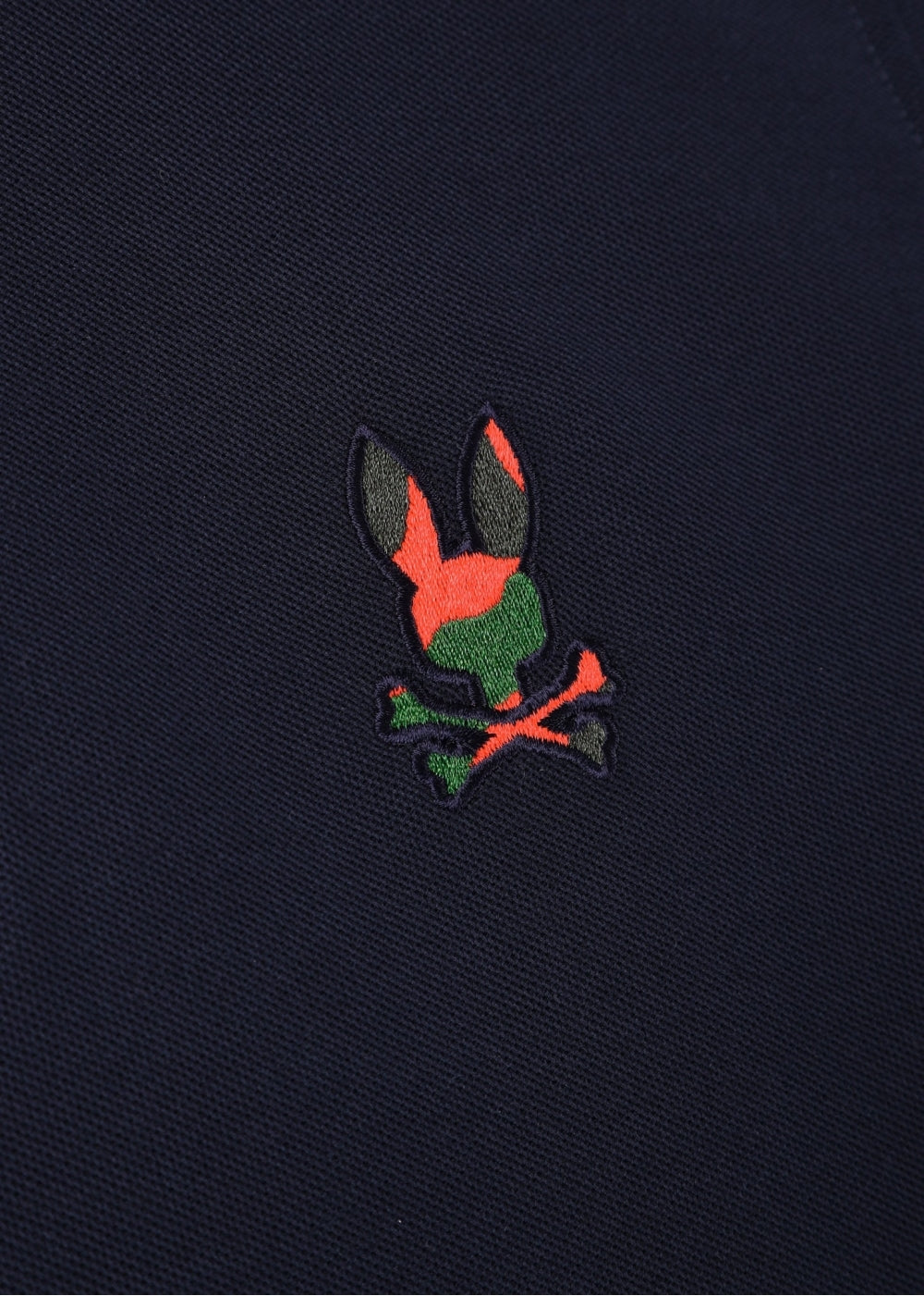 Camiseta Polo Psycho Bunny 🐰  Pique en color azul navy y naranja con diseño de cuello Talla M Entalle Regular