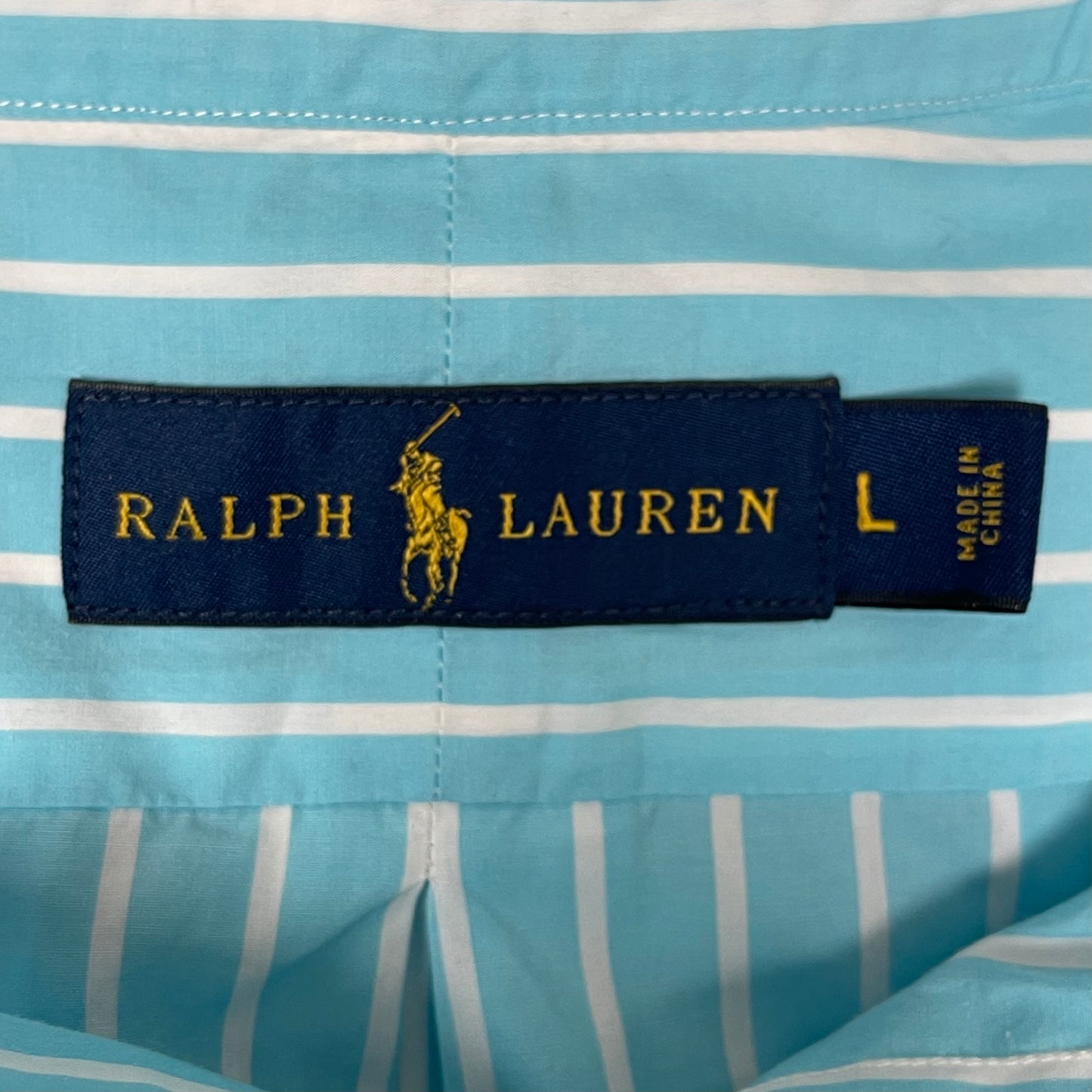 Camisa Polo Ralph Lauren 🏇🏼 Color turquesa con patron de rayas en color blanco Talla L Entalle Regular (ver descripción )