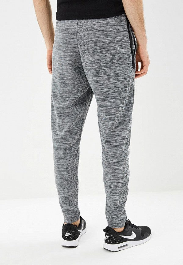 Pantalon Jogger marca Nike ✔️ con diseño degradado en color gris Talla L