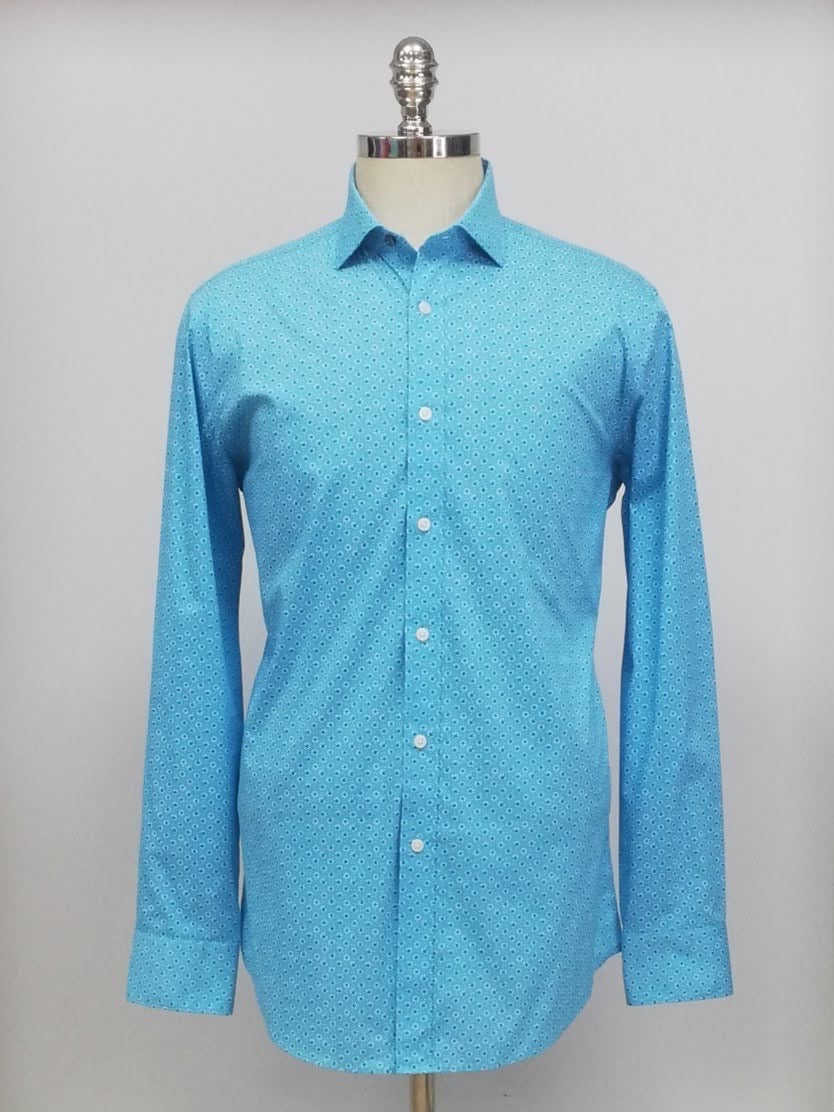 Camisa de botones Psycho Bunny 🐰 en color celeste y patron de flores en blanco Talla M Entalle Slim Fit