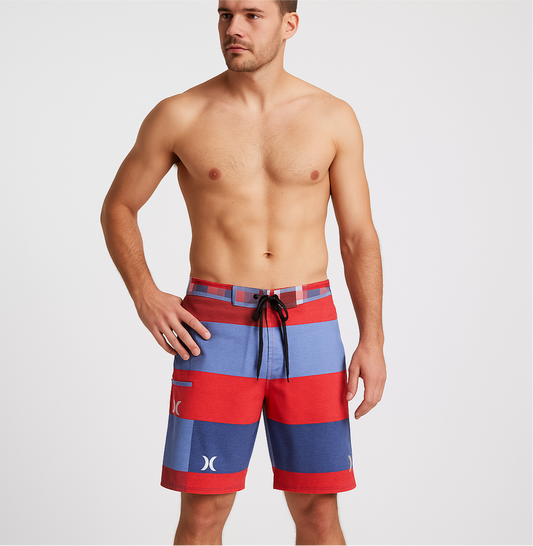Short de baño Hurley 🏄🏽‍♂️ con patron de cuadro en color rojo, azul y celeste y logo en color plateado talla M