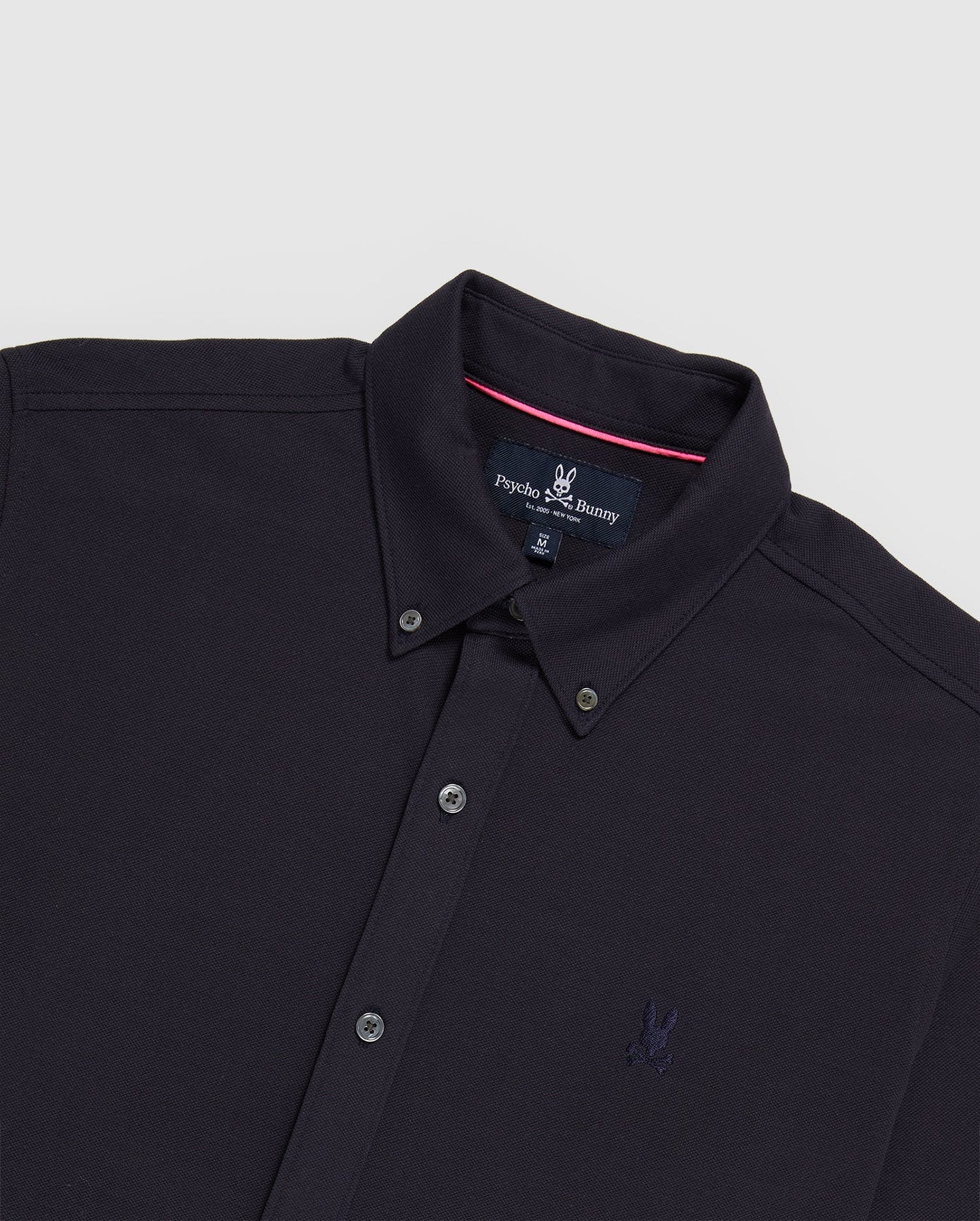 Camisa de botones Psycho Bunny 🐰  Tela camiseta (Pique Oxford) en color negro Talla S Entalle Regular