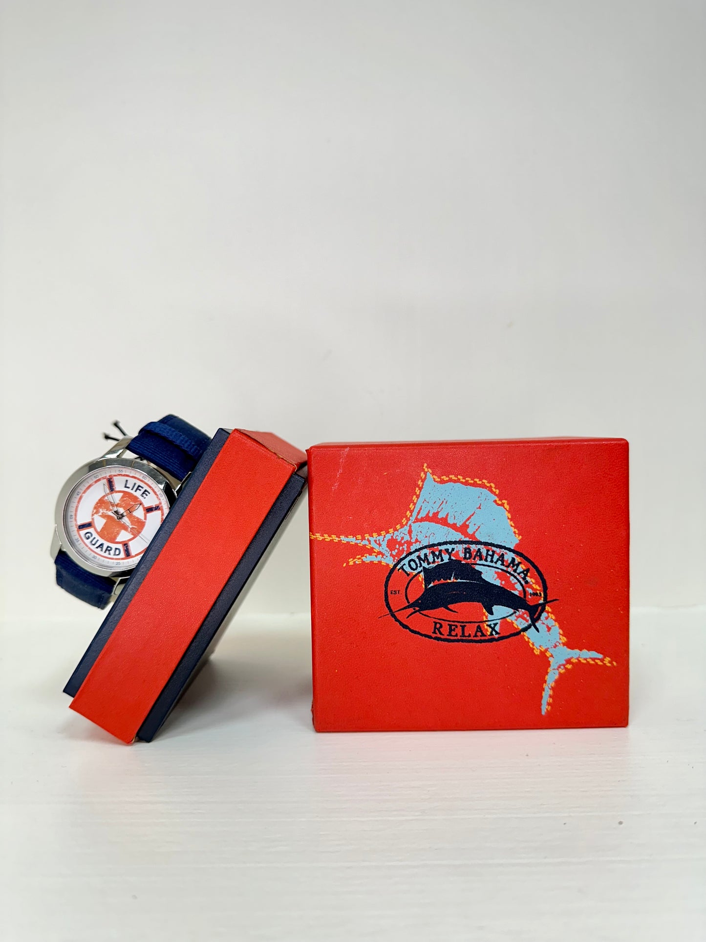 Reloj Tommy Bahama 🐠 Relax case plateado de 42mm y correa color azul