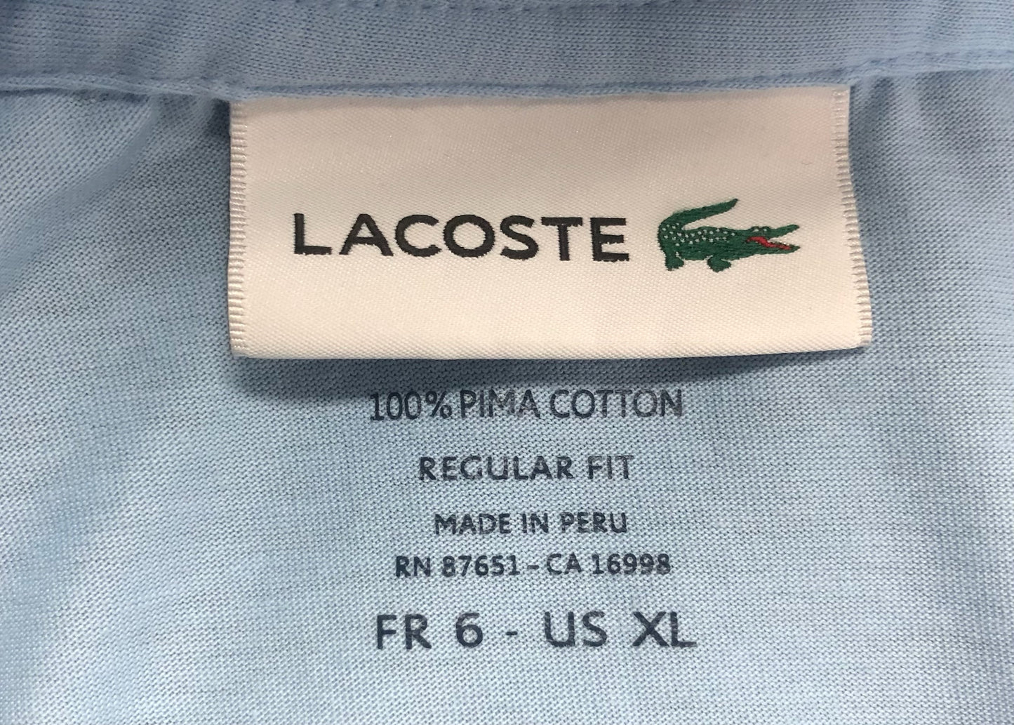Camiseta cuello Redondo Lacoste 🐊 color celeste con el logo bordado tradicional Talla Large