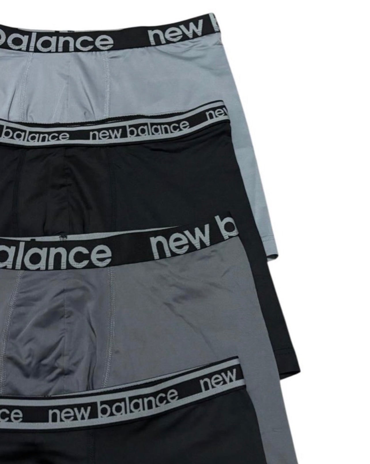 Combo de 4 Boxers Briefs New Balance Tela Performance color Negro y gris Talla L