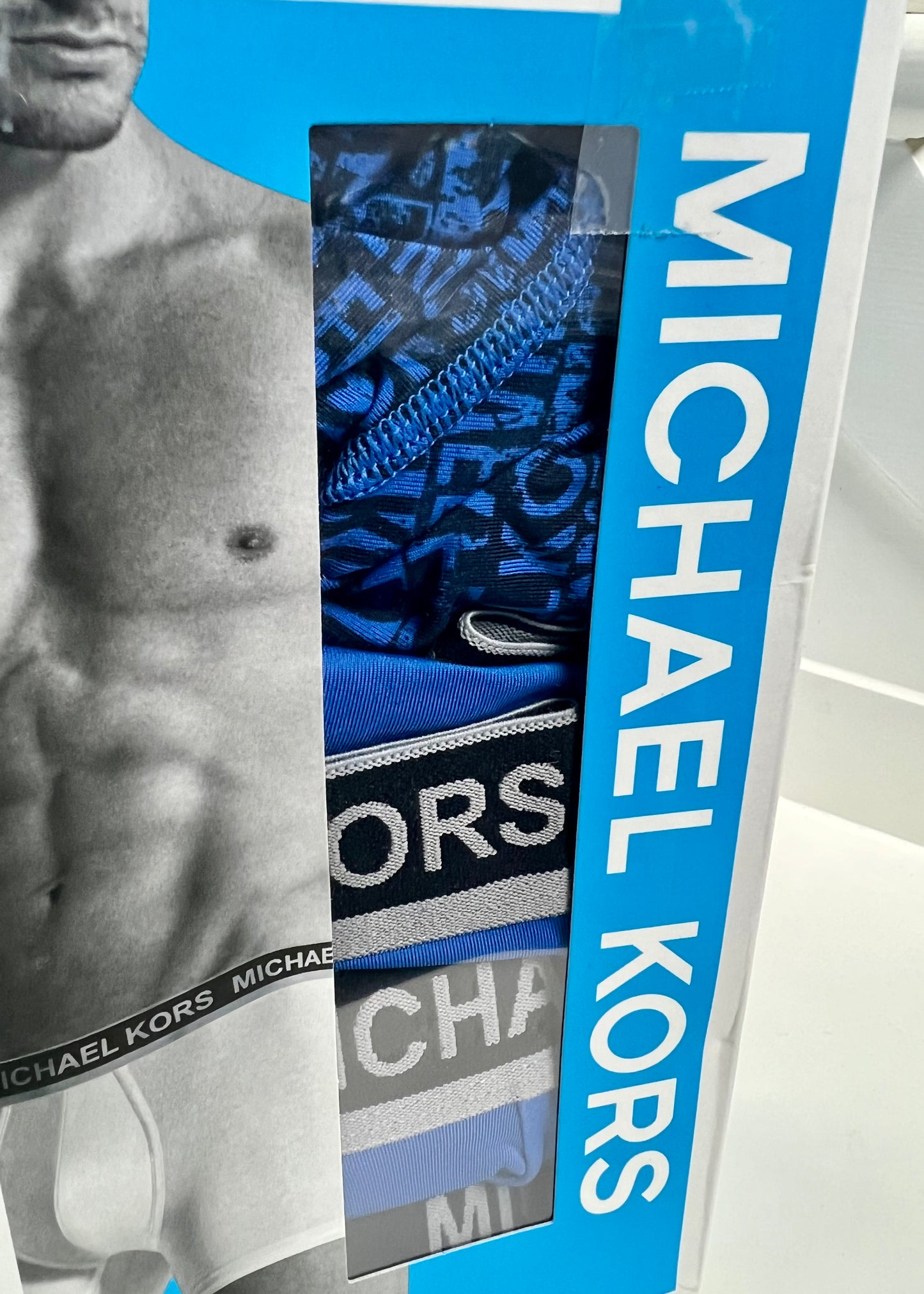 Combo de 4 Boxers Briefs Michael Kors color Azul y negro Talla S