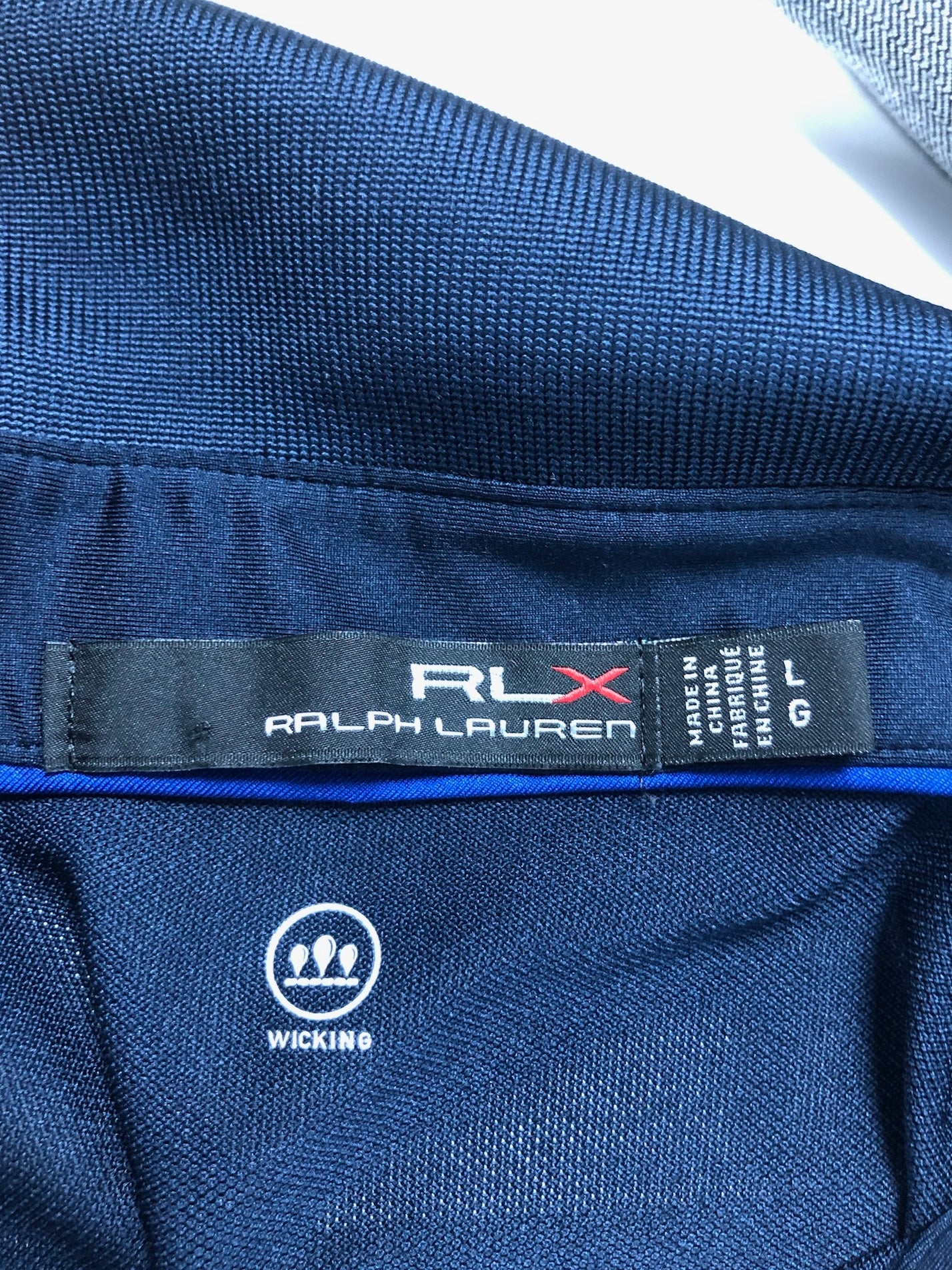 Camiseta Polo Ralph Lauren 🏇🏼 Tela performance de rayas color azul navy, blanco y azul Talla L Entalle Regular