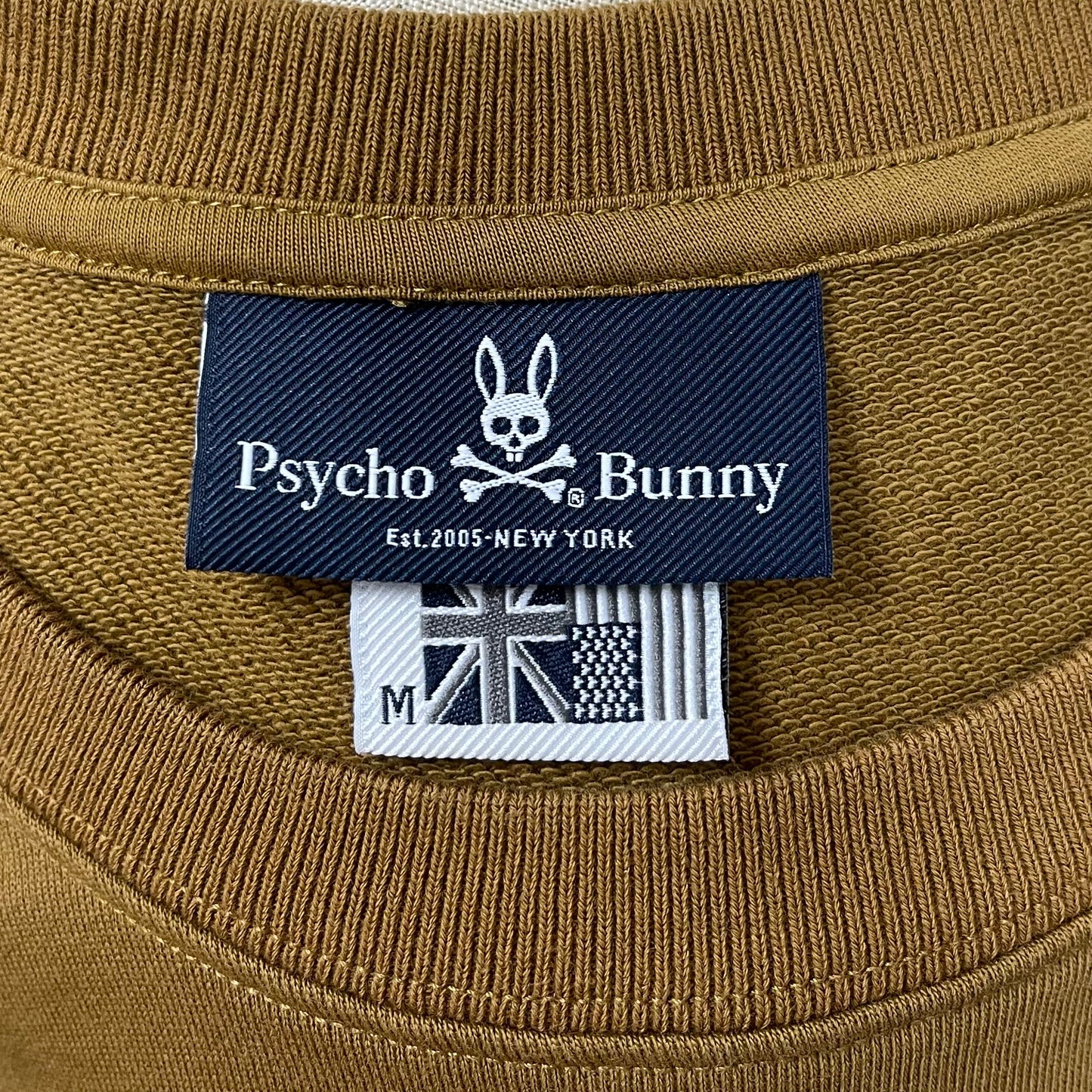 Sueter Jersey con cuello Redondo Psycho Bunny 🐰 color marón Talla M Entalle Regular