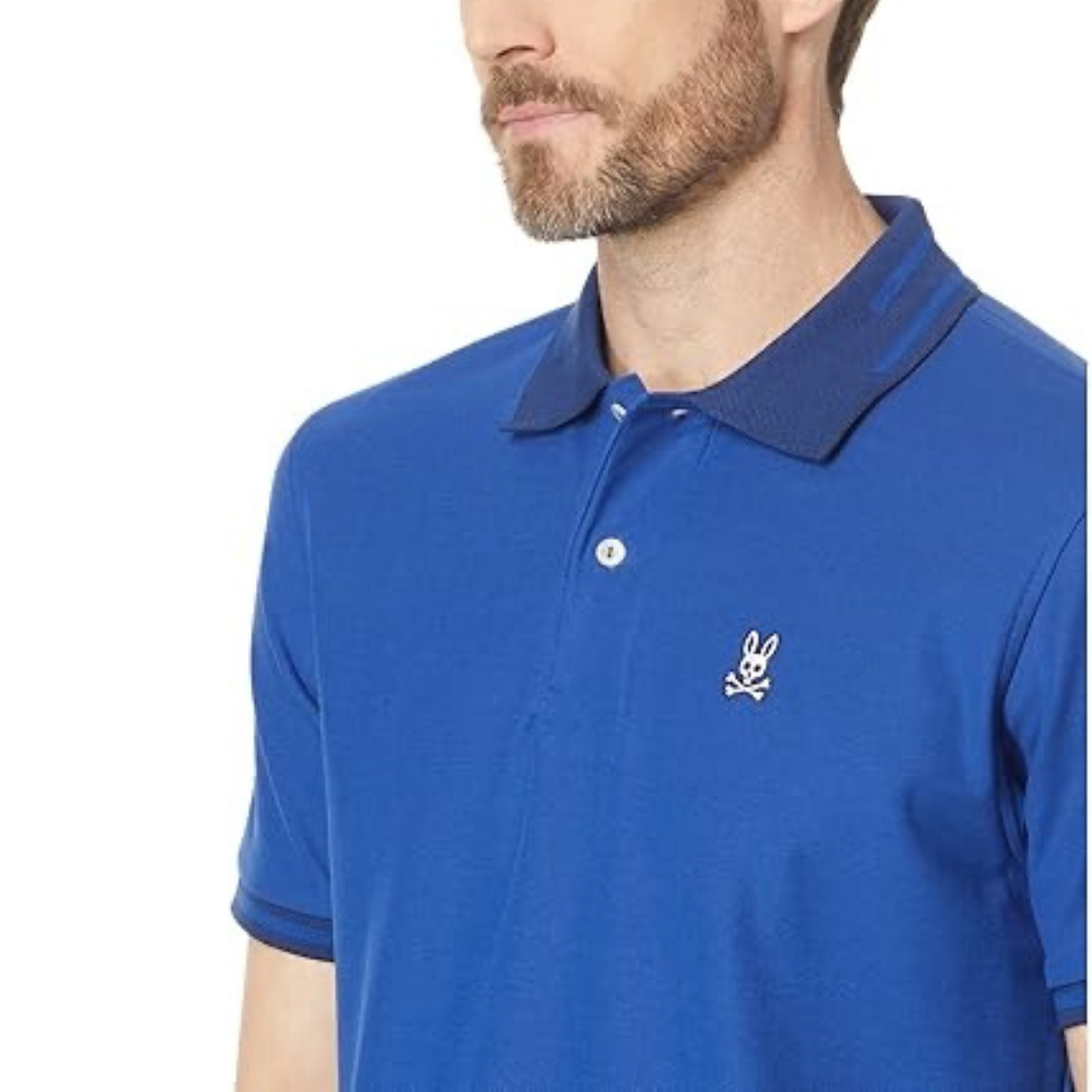 Camiseta Polo Psycho Bunny 🐰 Pique en color azul con diseño de cuello en azul oscuro Talla L Entalle Regular