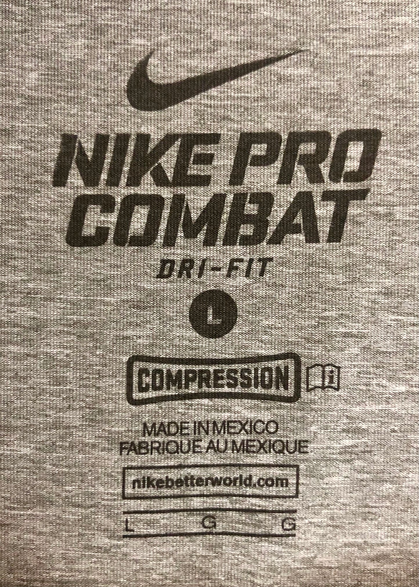 Camiseta de compresión Nike ✔️ color gris oscuro y logo en negro Talla L