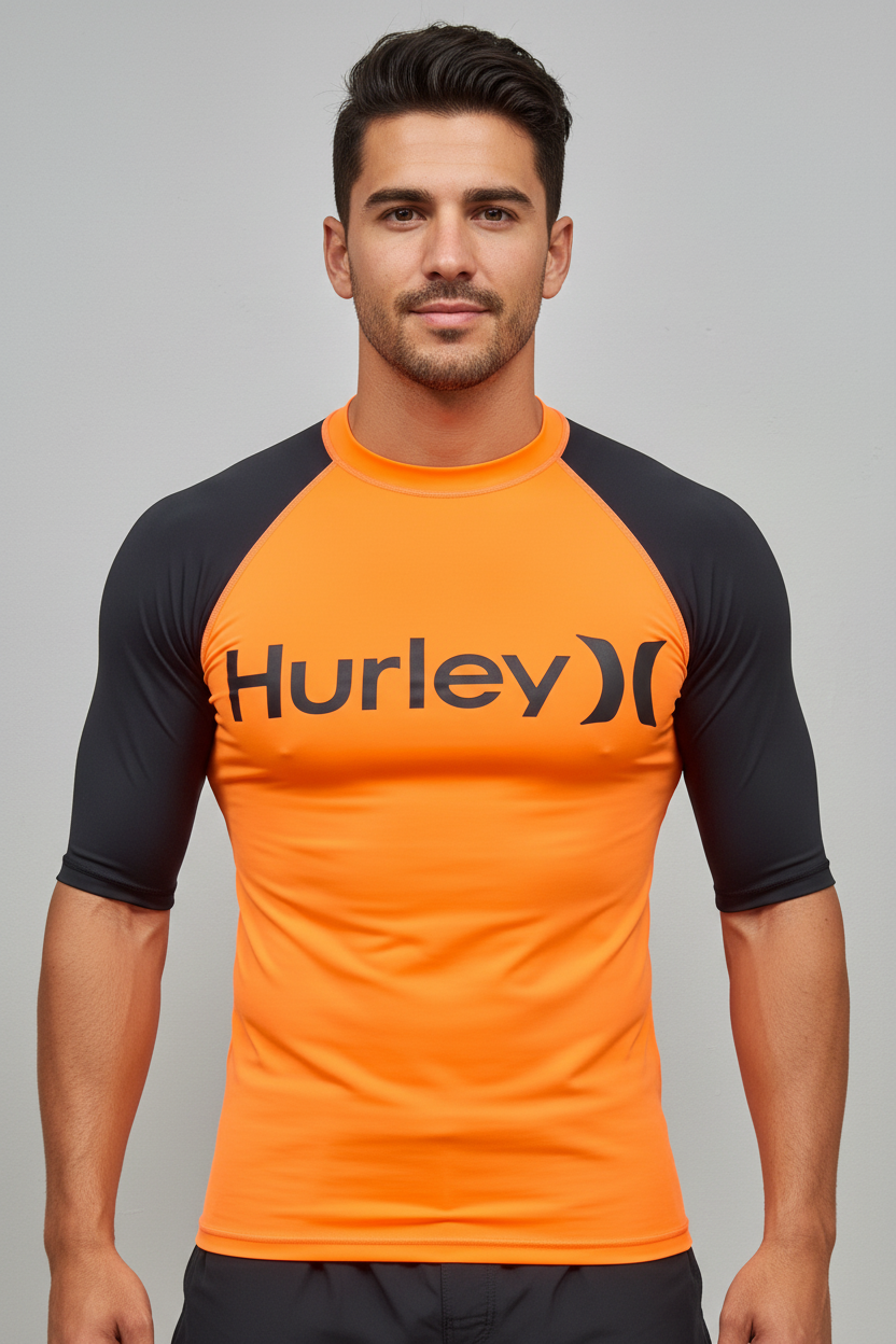 Camiseta de baño Hurley 🏄🏽‍♂️  color negro y naranja intenso y logo en negro Talla S