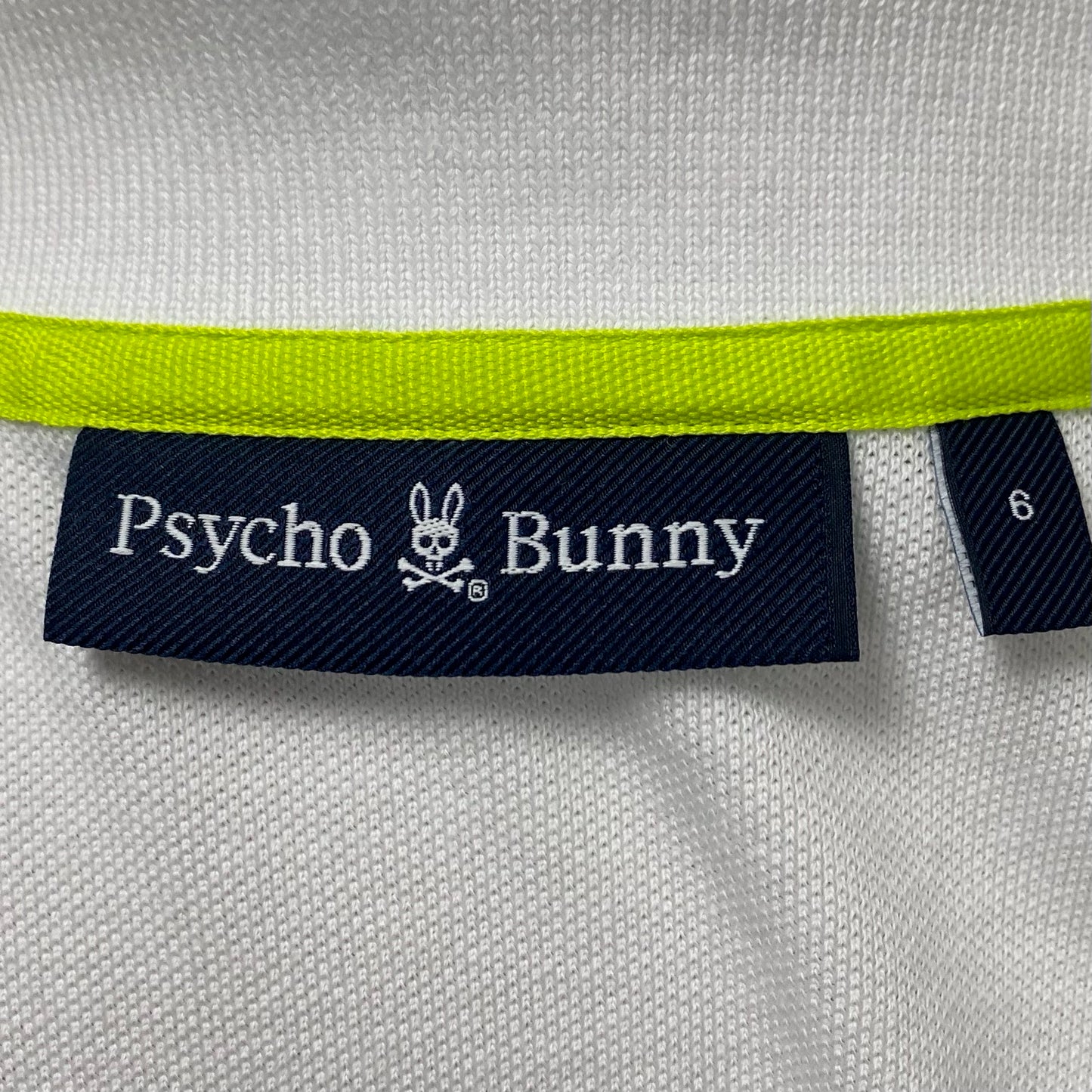 Camiseta Polo Psycho Bunny 🐰 Pique en color blanco con diseño de cuello en negro Talla L Entalle Regular