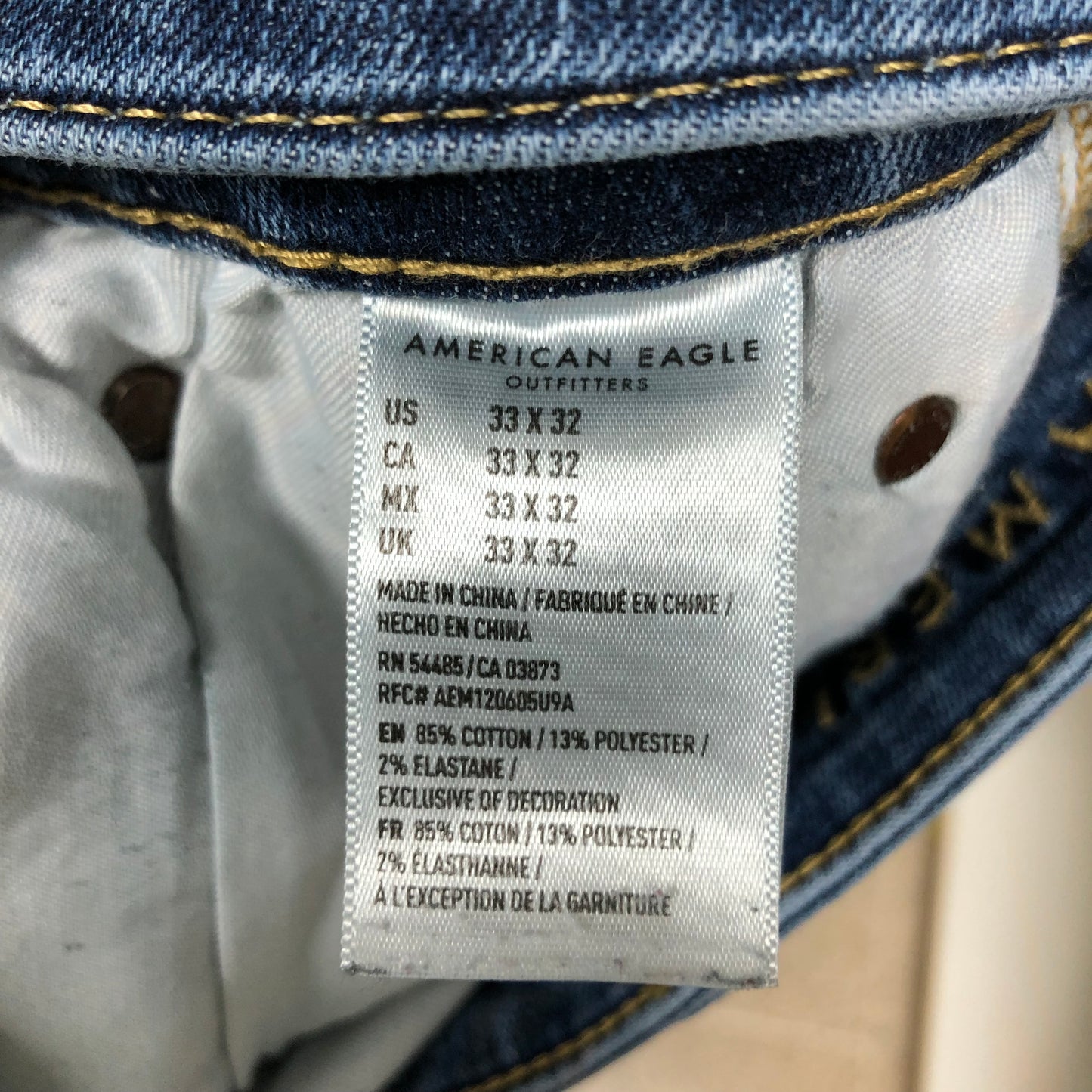 Pantalon jeans American Eagle 🦅  color azul oscuro Talla 33x32 Corte Slim Fit