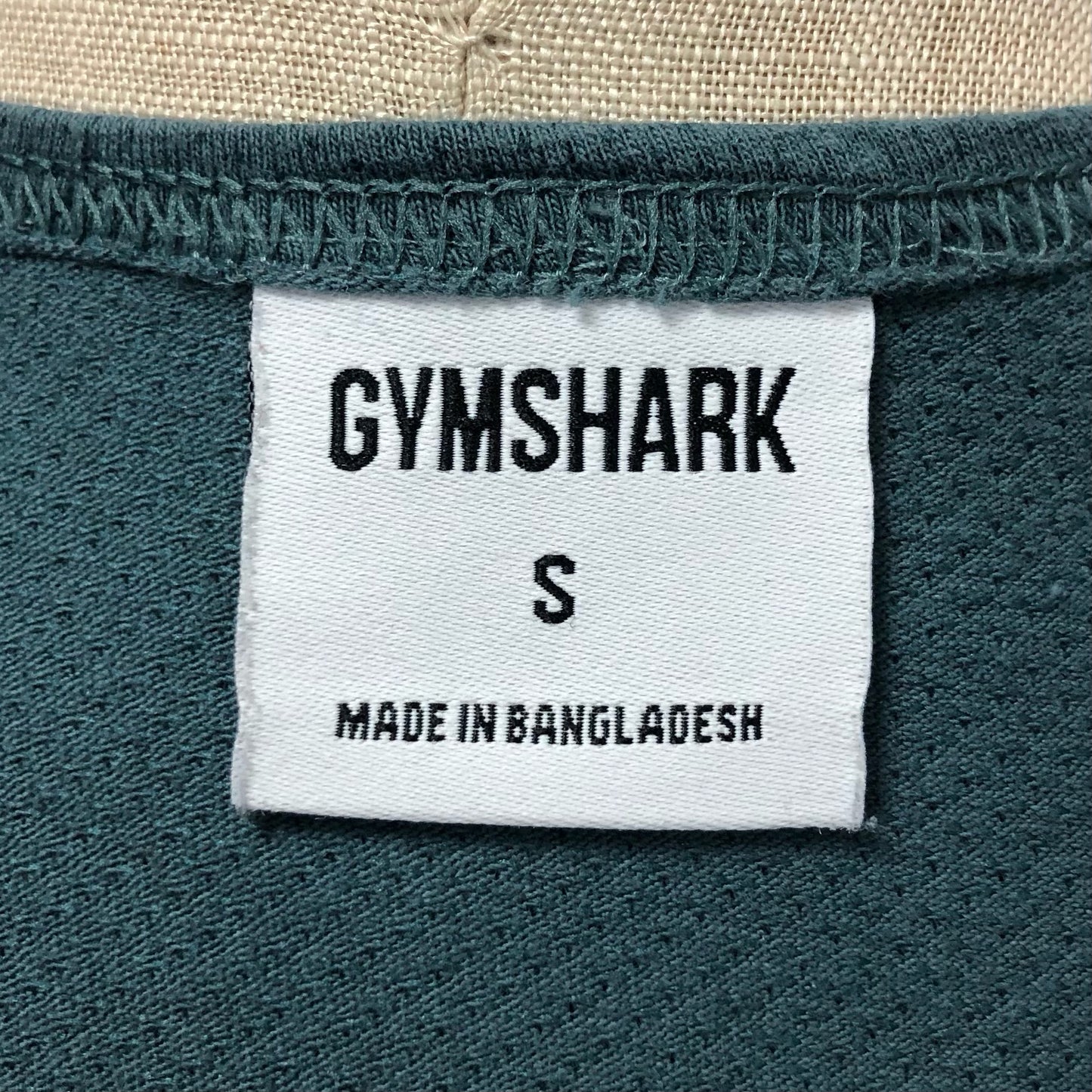 Camiseta de entrenamiento sin mangas Gymshark 🏋🏽 color verde oscuro y logo en blanco Talla S