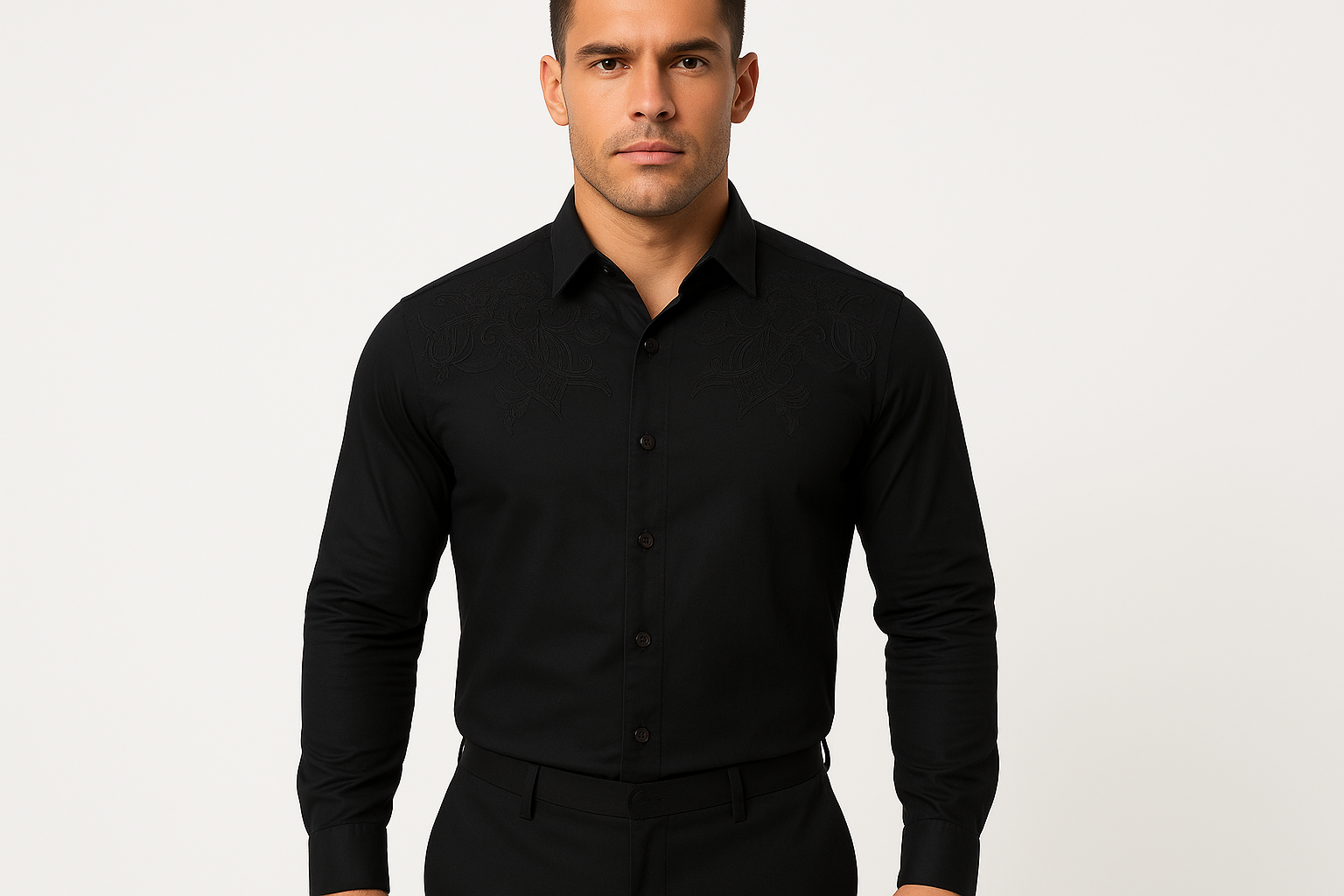 Athletic model wearing black shirt with detailed embroidery