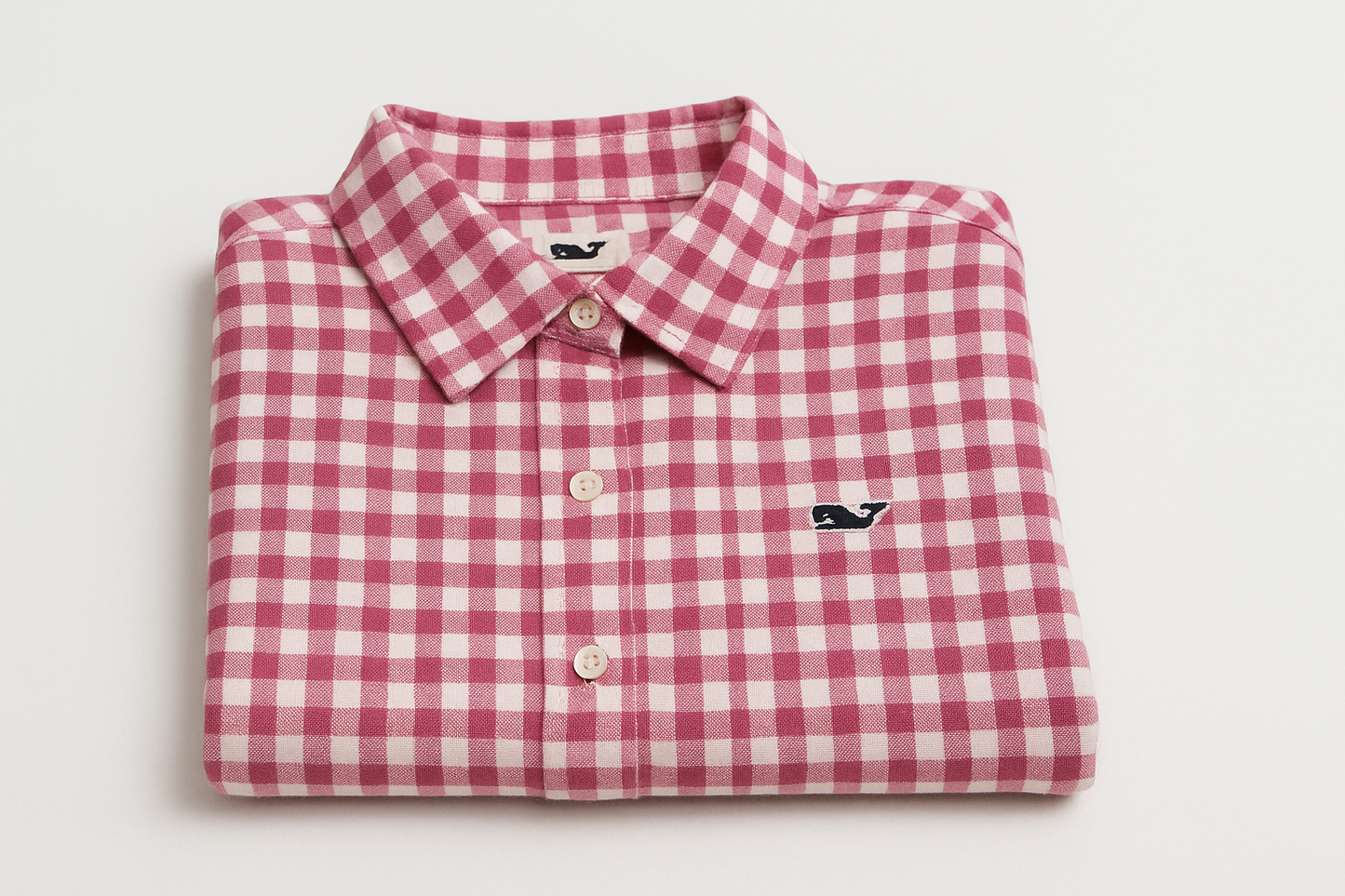 Camisa de cuadros rosa y blanco para mujer doblada vista lateral