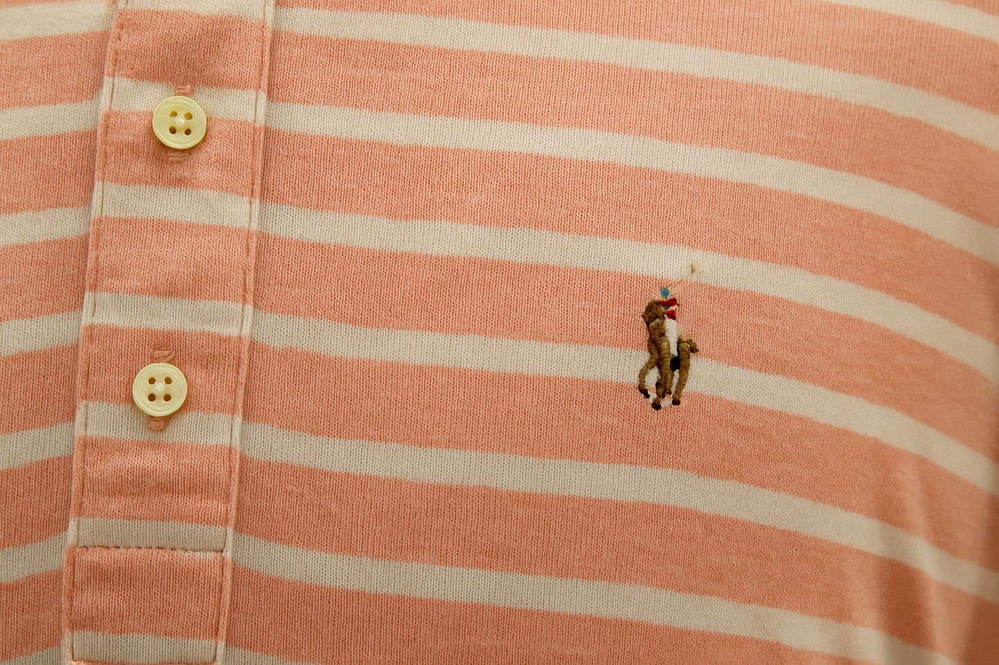 Detail shot of logo and stripes