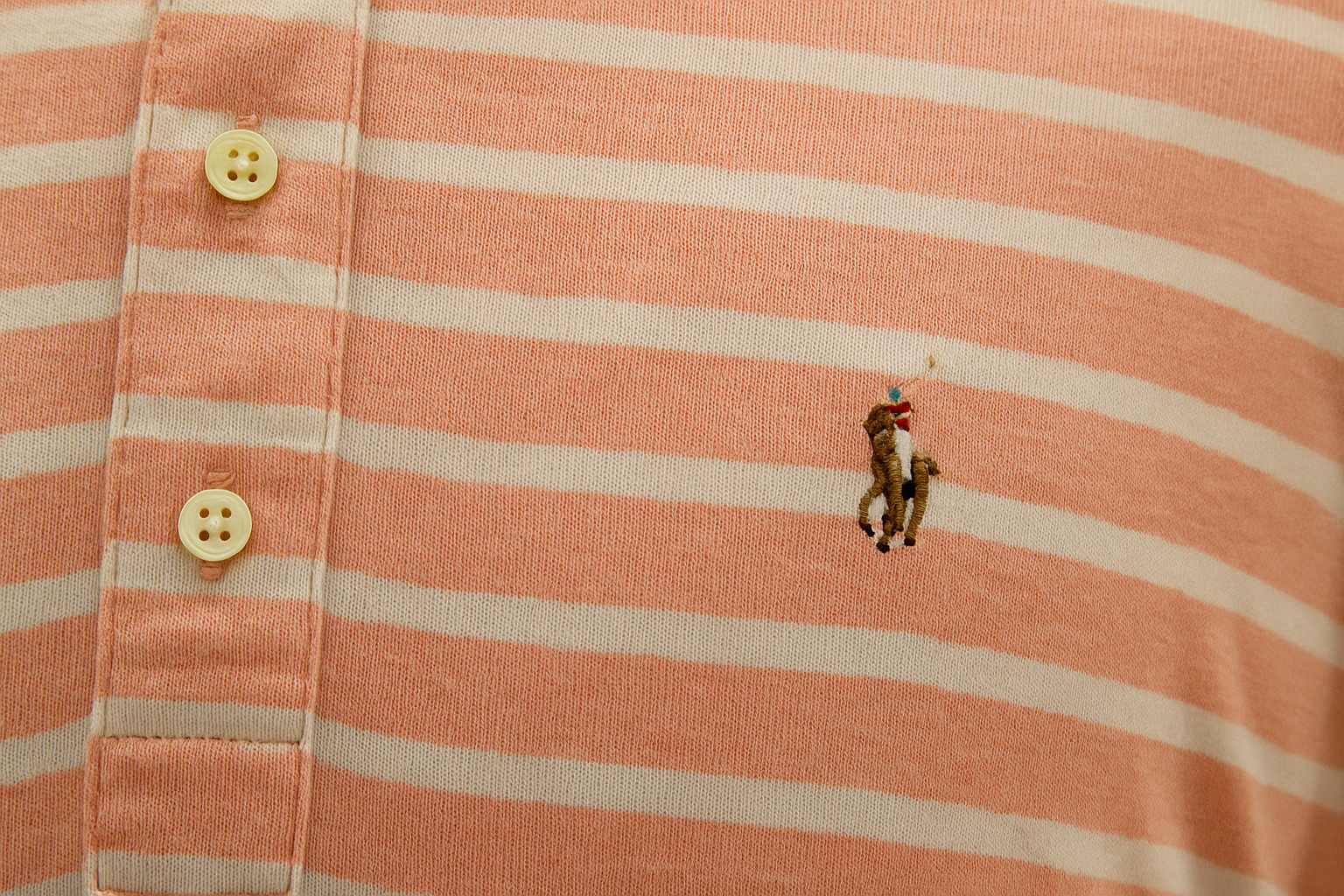 Detail shot of logo and stripes