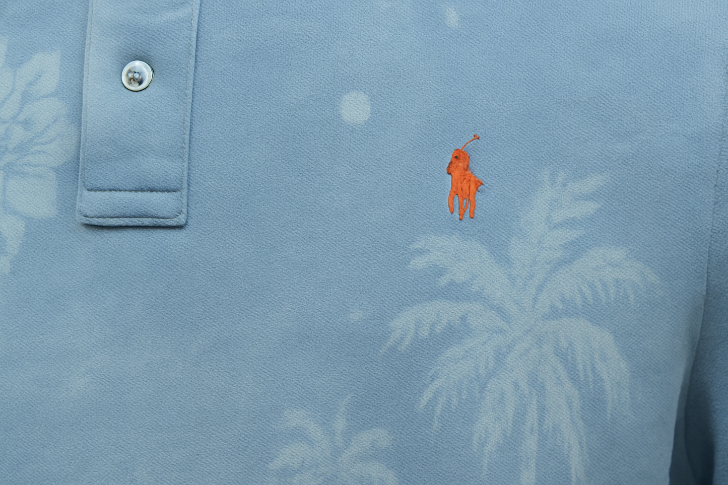 Detail shot of logo and tropical pattern