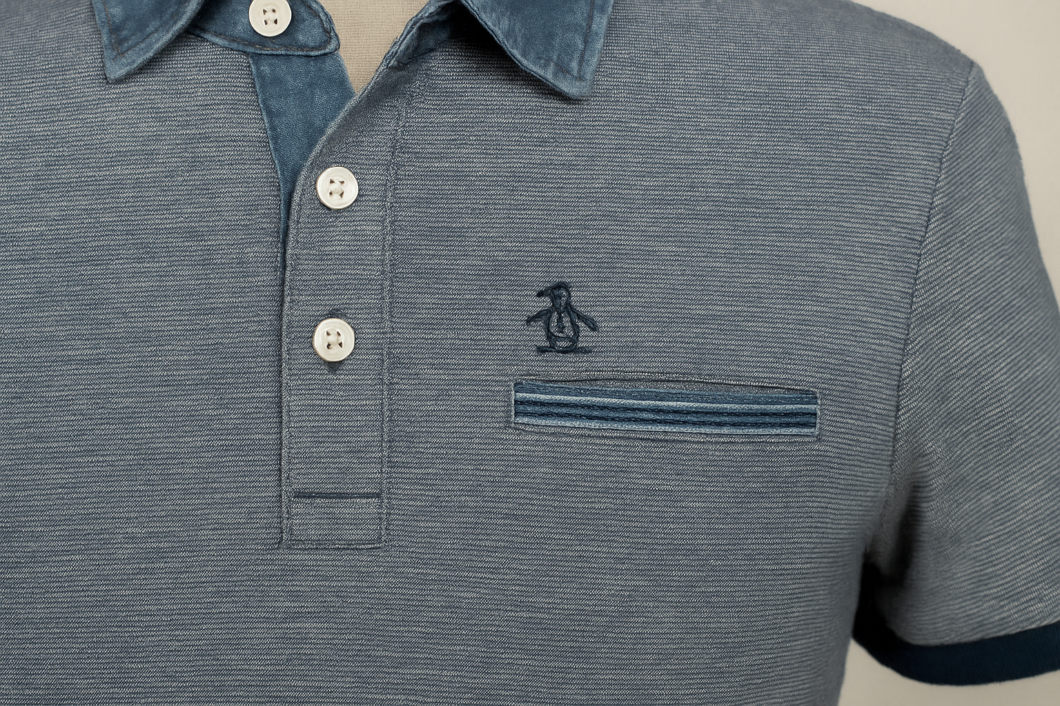 Detail shot of pocket and denim collar